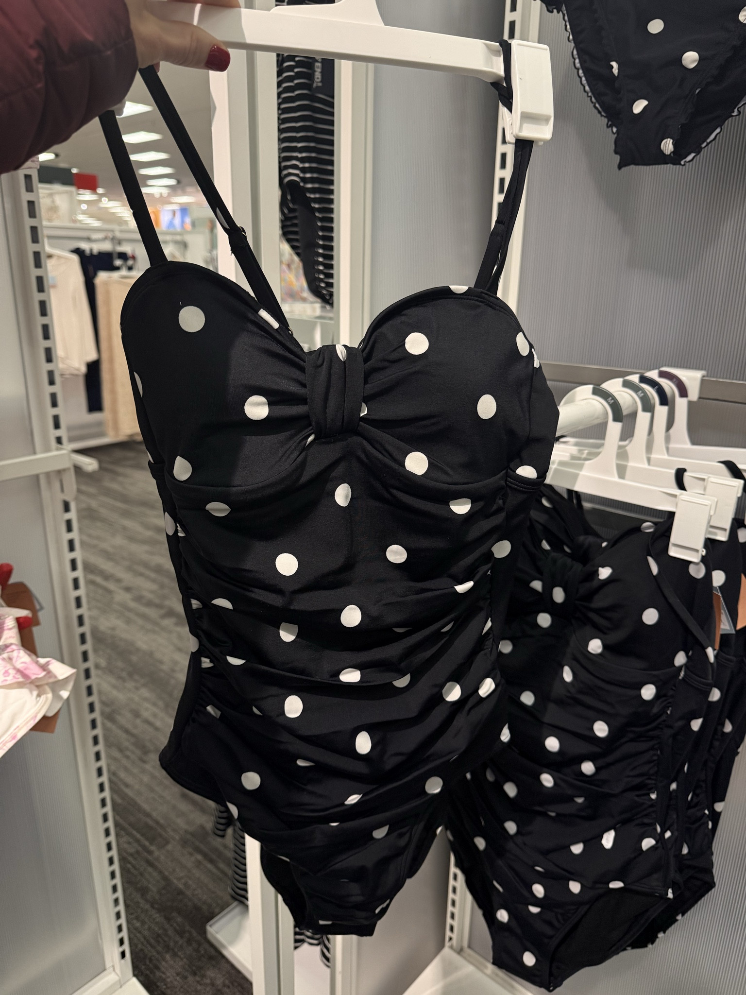 Black and white polkadot swimsuit 
Once piece swimsuit from Target 