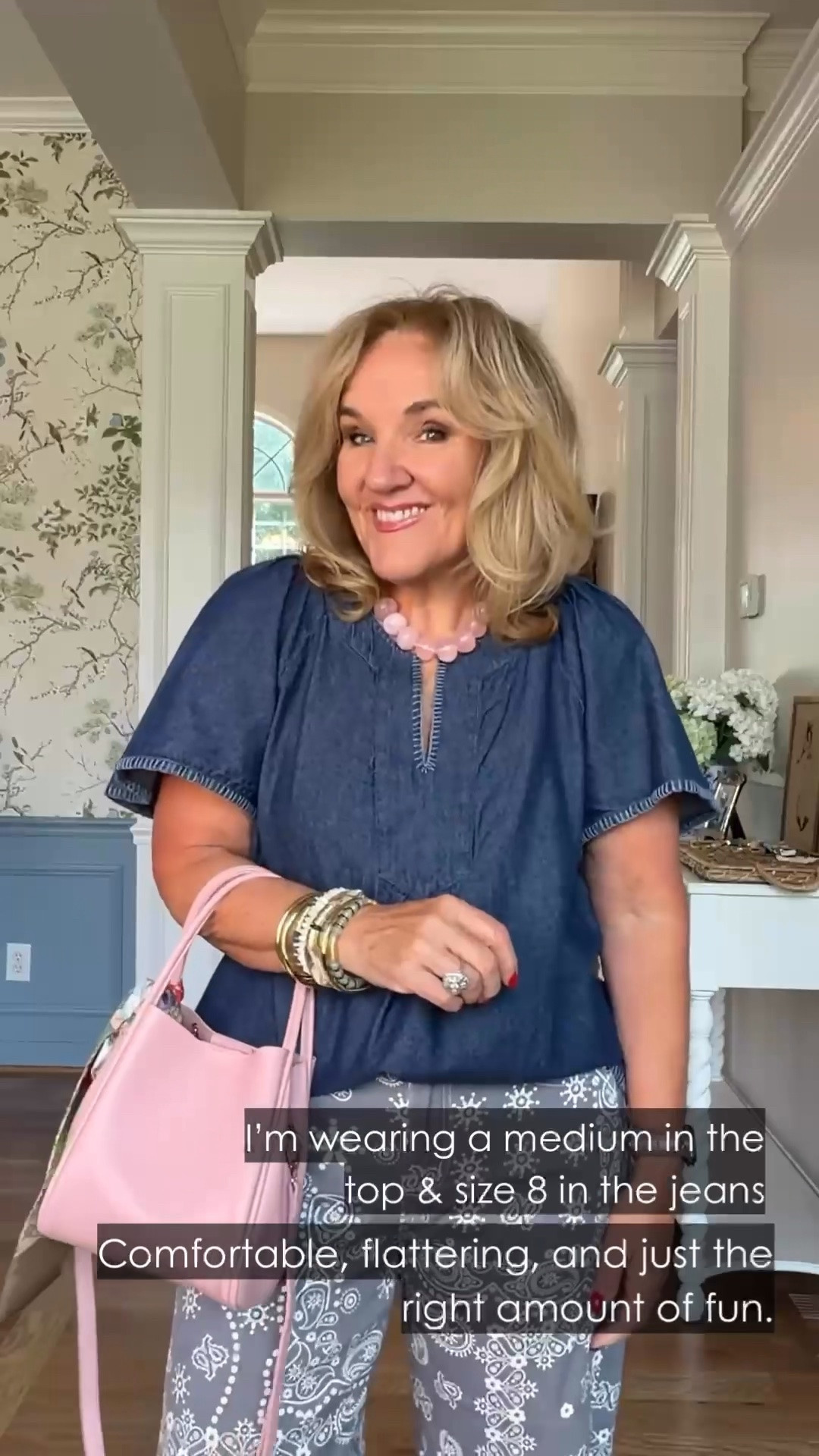 This denim top is an easy way to give patterned pants a polished, wearable feel. The soft, relaxed silhouette pairs beautifully with paisley print pants and a pink bag for a fun pop of color.

💡 LTK MADE EASY
❤️ Heart = Support my posts!
🔖 Save = Get sale & restock alerts
📋 Lists = Keep favorites organized
📲 Share = Send lists and products to a friend. Hello, Christmas List!
💬 Comment = Ask me anything about what I'm wearing.:-)

#LTKootd #LTKTravel #LTKOver40