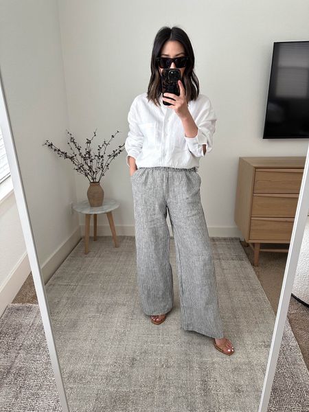 Spring linen favorites. Shirt runs super oversized, so size down. Pants are long, so I have them rolled here. Love love these pants - so classic summer. 

Top - Will oversized xs 
Pants - Ana Pants xs
Sandals - Gigi Straps heels 5.5. Run TTS 

Spring style, vacation outfit, spring fashion, neutral capsule wardrobe, travel style, petite outfit. 

#LTKSeasonal #LTKFind #LTKshoecrush