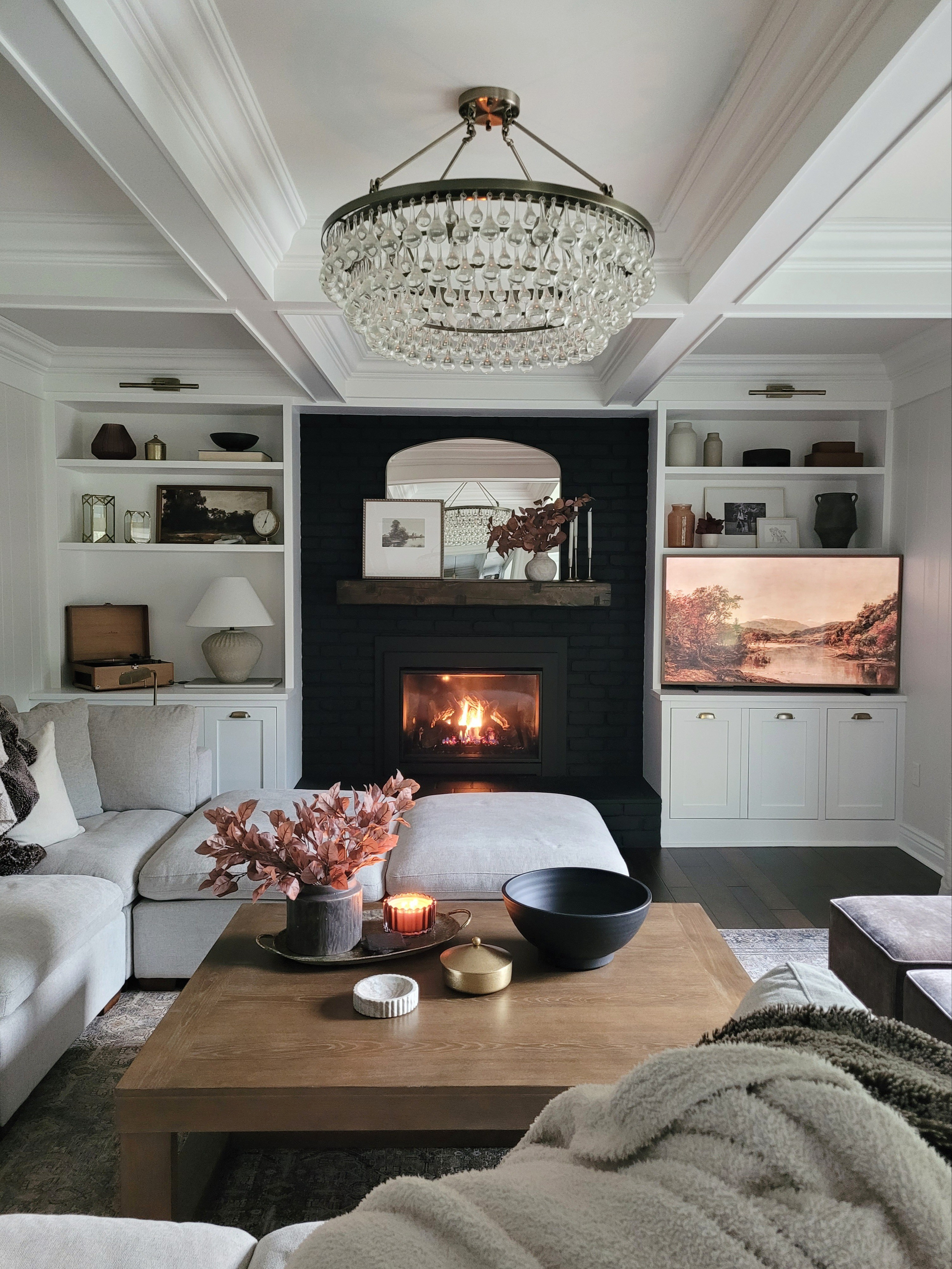 Fall decor doesn't need to be complicated - give me all the cozy fall vibes with candles, faux stems,  and vintage frame tv art! Home, shelf styling,  built ins,  coffee table styling,  living room,  family room,  home decor

#LTKStyleTip #LTKSeasonal #LTKHome