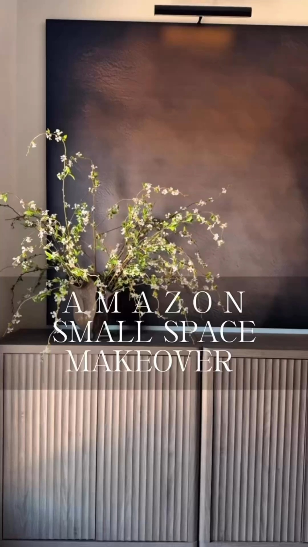 This little upstairs nook finally got some love 🤎✨ I styled it with stackable entryway cabinets, oversized Amazon wall art, a wireless picture light, and simple faux florals for a soft, minimal look. Amazing how a few Amazon finds can completely refresh a small space.


#amazonhome #amazonfinds #entrywaydecor #smallspaceupdate #modernhome #neutraldecor #vignettestyling #wirelesspicturelight #oversizedart #amazonart #amazonvase #fauxflorals #minimaldecor #familyfriendlystyle
Summerthompsonstyles

#LTKHome