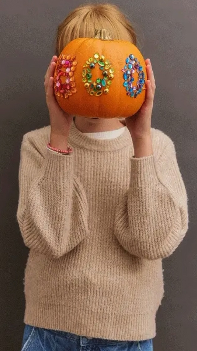 Decorating made easy with Bauble Bar Kids DIY Pumpkin Decorating Craft Kit 

Create bedazzled pumpkins the whole family will love! This no-carve decorating kit includes everything you need – just add your own pumpkins (not included).

First, pick your main design.  Select from 4 large stickers - featuring two jack-o-lantern faces and two Halloween phrases.  Then use the extra cabochons and crystals to add your own designs and even more sparkle. This pumpkin kit makes decorating easy for every age and skill level.

Each kit includes:
4 large, double-sided Halloween-themed stickers. Choose between two joyful jack-o’-lantern faces or two Halloween phrases (“BOO”! and “Spooky”)
200 colorful cabochons to create unique designs or accent the stickers
240 mixed-shape crystals that bring plenty of sparkle and shine, especially when they catch the glow of Halloween candlelight
100 mess-free glue dots that make decorating (and cleanup) a breeze—no sticky fingers here
Decorates 4 medium pumpkins
However you dress them up, they're guaranteed to be the cutest pumpkins on the block.

#LTKSeasonal #LTKKids #LTKmomlife