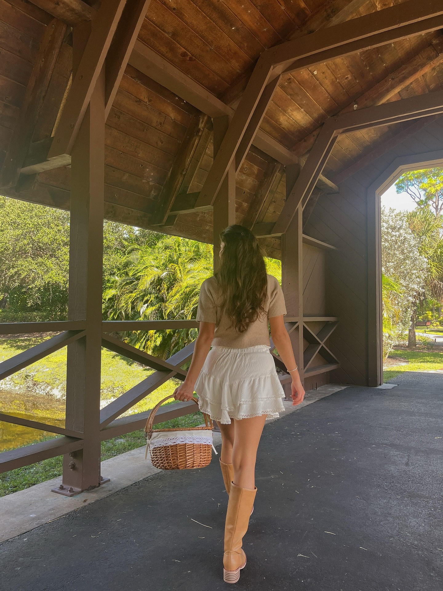 Hanging out under a wooden covered bridge after a little stroll through nature 🤎🍂🪵 I found this spot years ago and it has always been a little gem here in south florida