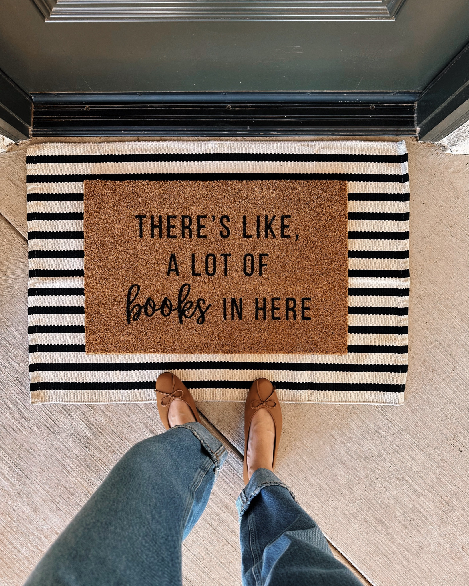 Obsessed with our new doormat!! I was looking at a few different options but as soon as I saw this one about books I knew it was the winner 😂😍📚 I love this layered look with having the striped mat underneath too! 

Welcome mat, layered doormat, home decor inspo, front door decor

#LTKStyleTip #LTKHome