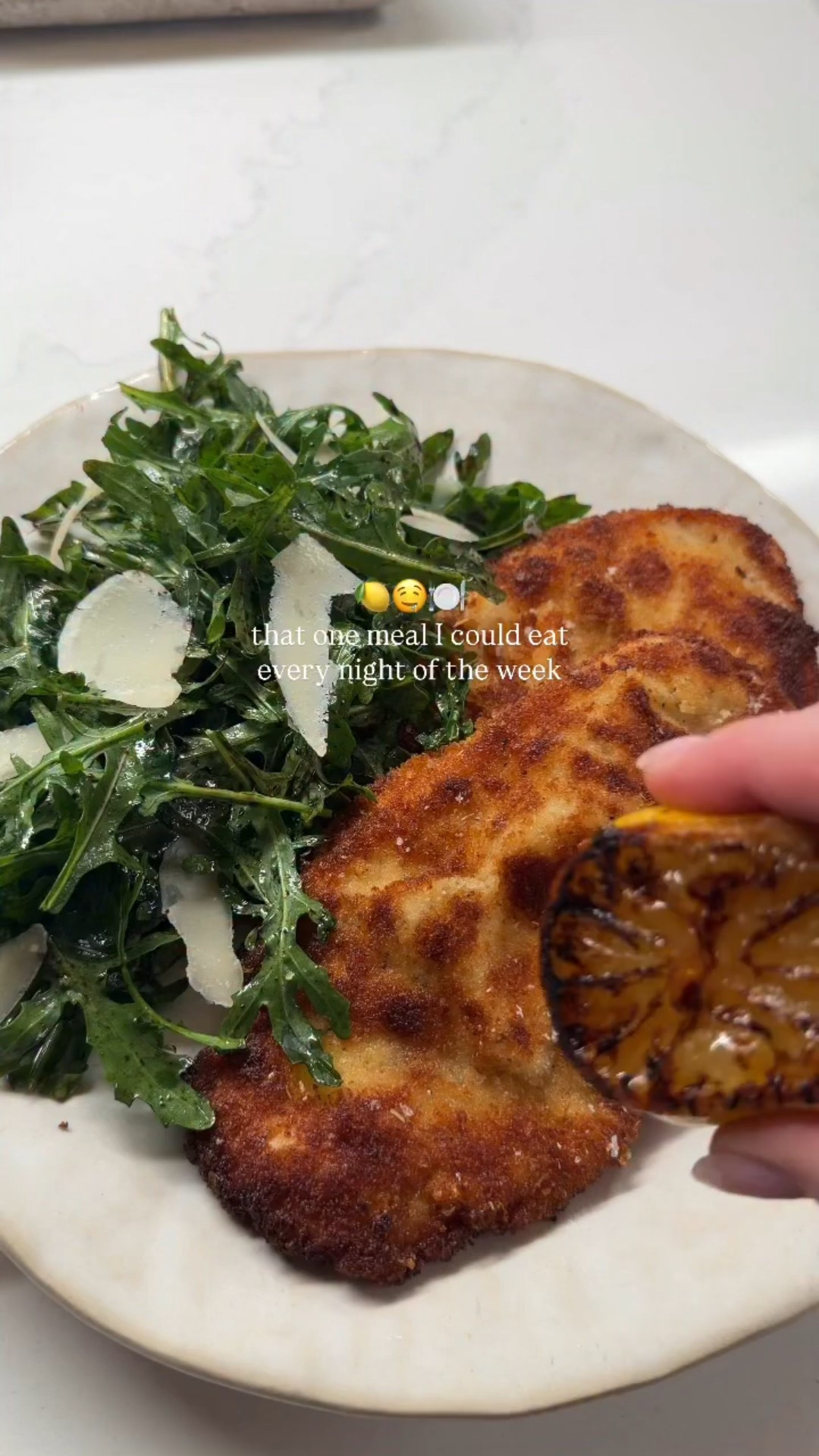 Causally eating this 3x a week 😛

Ingredients: 1 lb thin-pounded chicken cutlets Flour Eggs Panko + parmigiano, salt & Italian seasoning Avocado oil, i used @chosenfoods  Arugula, olive oil & a splash of balsamic Grilled lemons

To-do: Dredge chicken in flour, eggs, then panko mix. Pan-fry in avocado oil until golden + crispy.  Grill lemons in the same pan. Toss arugula with olive oil + balsamic and serve on top.
Squeeze lemons over chicken & enjoyyy. 

P.s shallow-fry tip: shake of excess flour/egg/panko with each step, and make sure oil isn’t too hot when the chicken goes in! I often put a little chip or herb in the oil, and when it starts sizzling i know it’s ready. 🔥