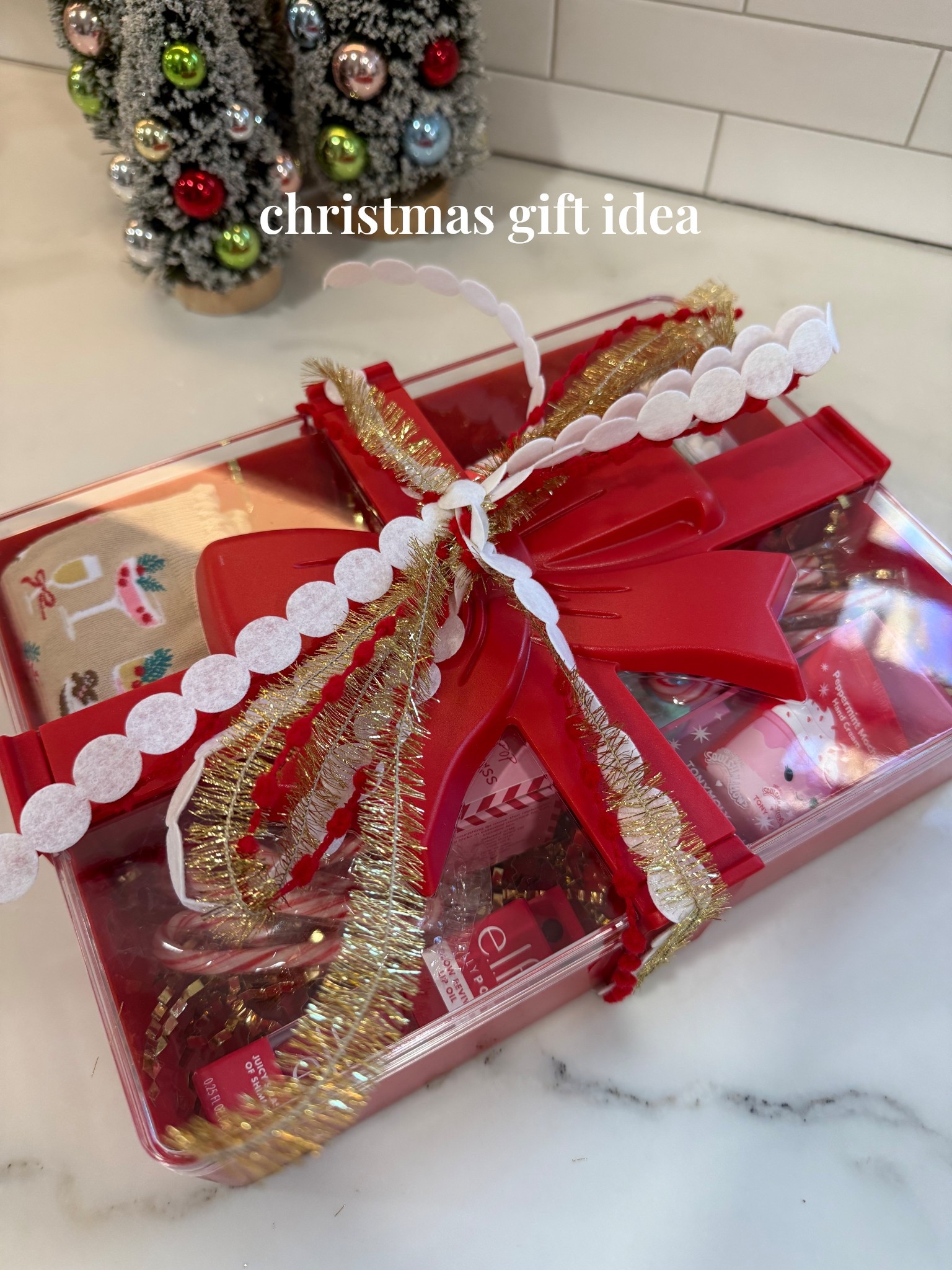 Christmas Gift idea! 🎅🏻 This target bow container makes the perfect gift idea! I love adding a few of my favorite things to the container for a teacher friend or sister! 

#LTKGiftGuide #LTKHoliday #LTKSeasonal
