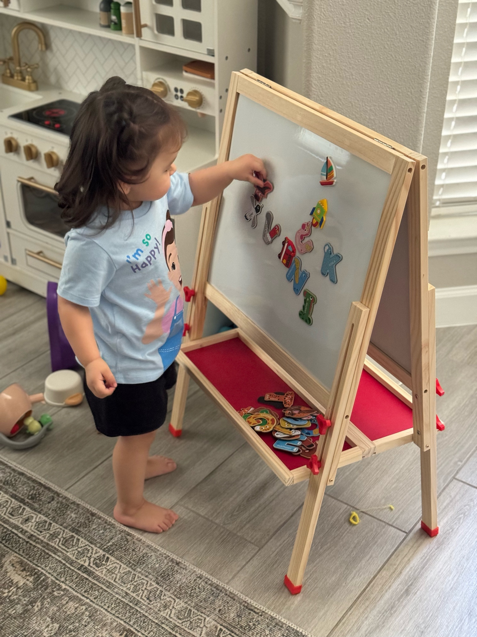 If your little one loves magnets or drawing this easel is perfect to keep them entertained. #LTKkids