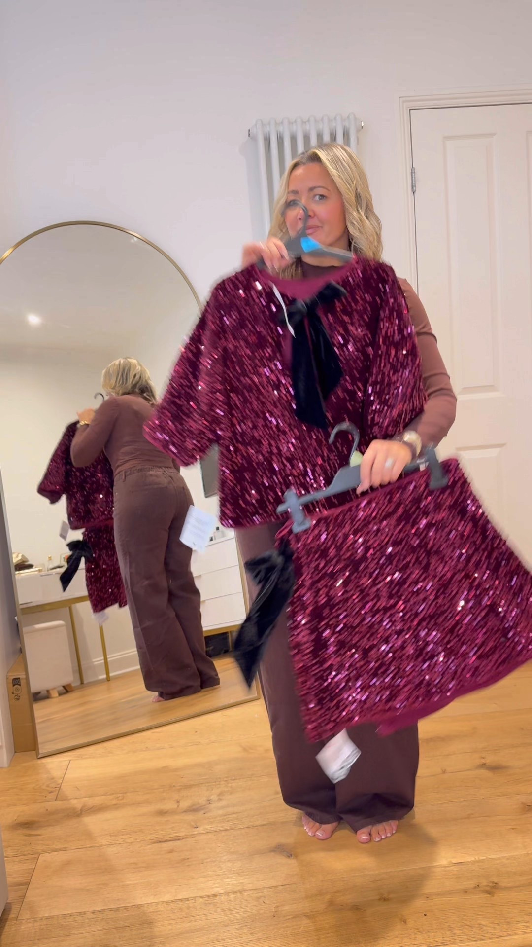 A little bit of sparkle for tonight's party outfit And WOW colour of this set is insane
Love the colour love the sequence love the velour bow and the other thing that I'm absolutely loving about this is that you can wear the top with some nice jeans or trousers and then the skirt with a nice knit jumper and it would make the perfect Christmas day outfit so you're getting more than one out of it out of this set which I absolutely love let's face it we all want multi were items in our wardrobe especially at this time of year

#LTKwinter #LTKmidsize #LTKpartywear