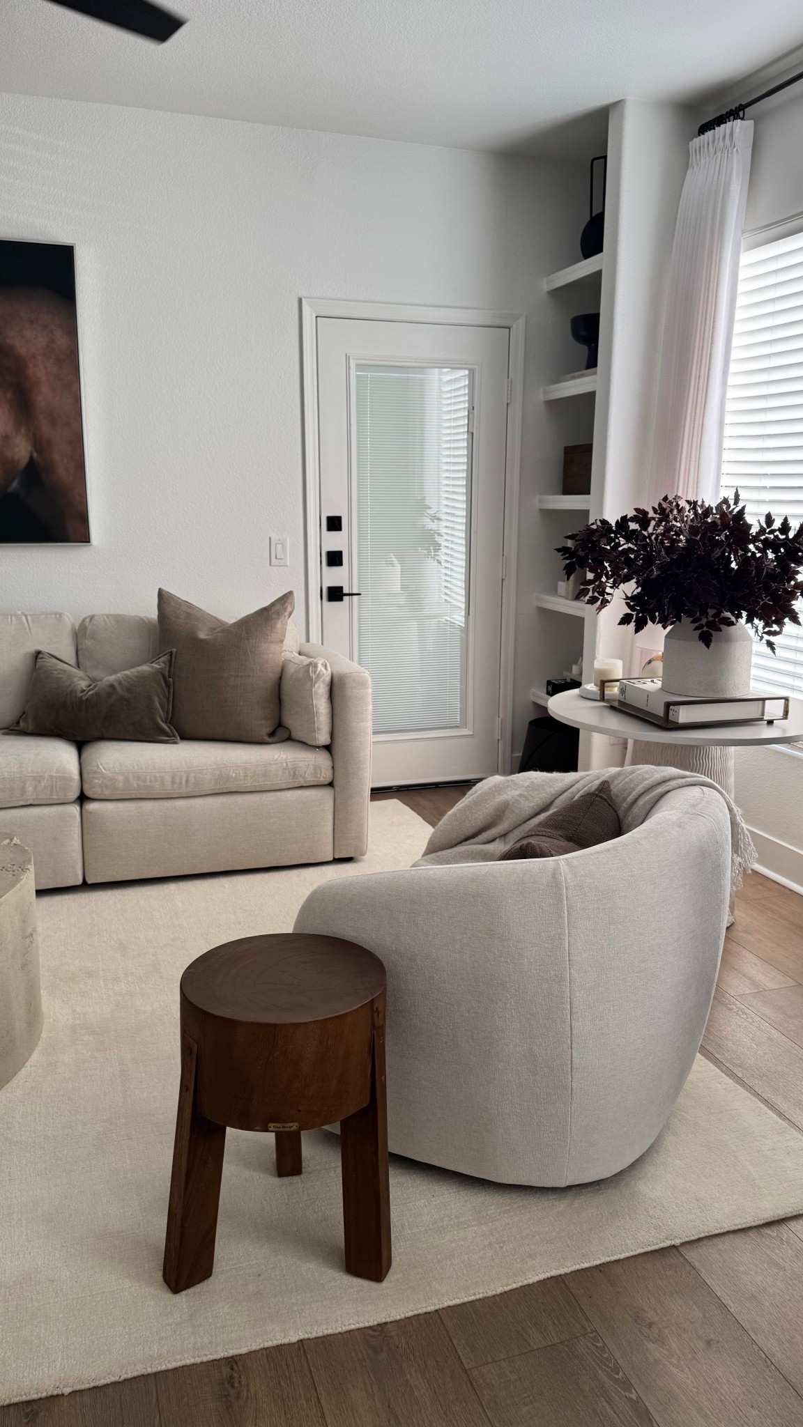 Organic modern living room styling

Swivel chair, neutral decor, brass tray, accent table, neutral

#LTKHome