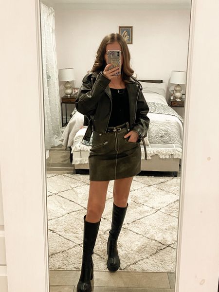 A faux leather moto jacket paired with a mini skirt, black knee high boots and black bodysuit makes a cute going out or fall outfits idea. 
.
.
.
.
.
.
.
#LTKCyberWeek 
#LTKHolidaySale #LTKGiftGuide #LTKSeasonal #LTKFind #LTKunder50 #LTKunder100 #LTKHoliday #LTKU #LTKsalealert #LTKfindsunder50 #LTKfindsunder100 #LTKstyletip #LTKworkwear #LTKtravel #LTKshoecrush #LTKitbag 
Leather jacket outfit | faux leather jacket | cropped leather jacket | leather moto jacket | fall jacket | green jacket | skirt outfits | skirt with boots | skirt set | fall leather skirt | green skirt | leather skirt outfit | mini skirt outfit | boots outift | boots 2023 | boots black | fall boots | bodysuit outfits | black bodysuit | going out outfits | going out jacket | outfit inspo | outfits fall | black leather boots | 