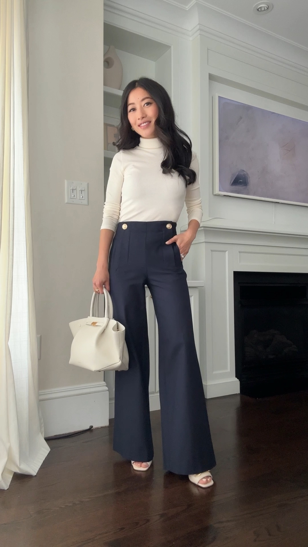 Last day (march 7th) for half off these trousers! 4 colors and also come in a shorts style 

• wide leg sailor trousers 00P - these are so flattering from all angles and can go from work to weekend brunch paired simply with a tee or tank. 

Waist fits slightly loose and me (I have a 25” waist) and I am 5 feet tall and need to wear with 3+ inch heels 

00P measures 13” across waist, 10” rise, 29” inseam 

 Also recommend the ann Taylor Audrey crop linked (runs smaller, I went 1 size up to 0P in the Audrey crop)

• Madewell turtleneck xxs

• ann taylor Chain mules 5 , so good and comfy for a heel 

• Demellier bag - absolutely gorgeous, with quality that rivals that of my higher end bags 

• Uniqlo coat xxs runs big!

With the camel pants I showed jcrew cardigan jacket xxs and reformation square neck tank Xs , both linked below 

#petite spring outfits 

Spring transitional work workwear outfit #LTKSpringSale 

#LTKSeasonal #LTKworkwear