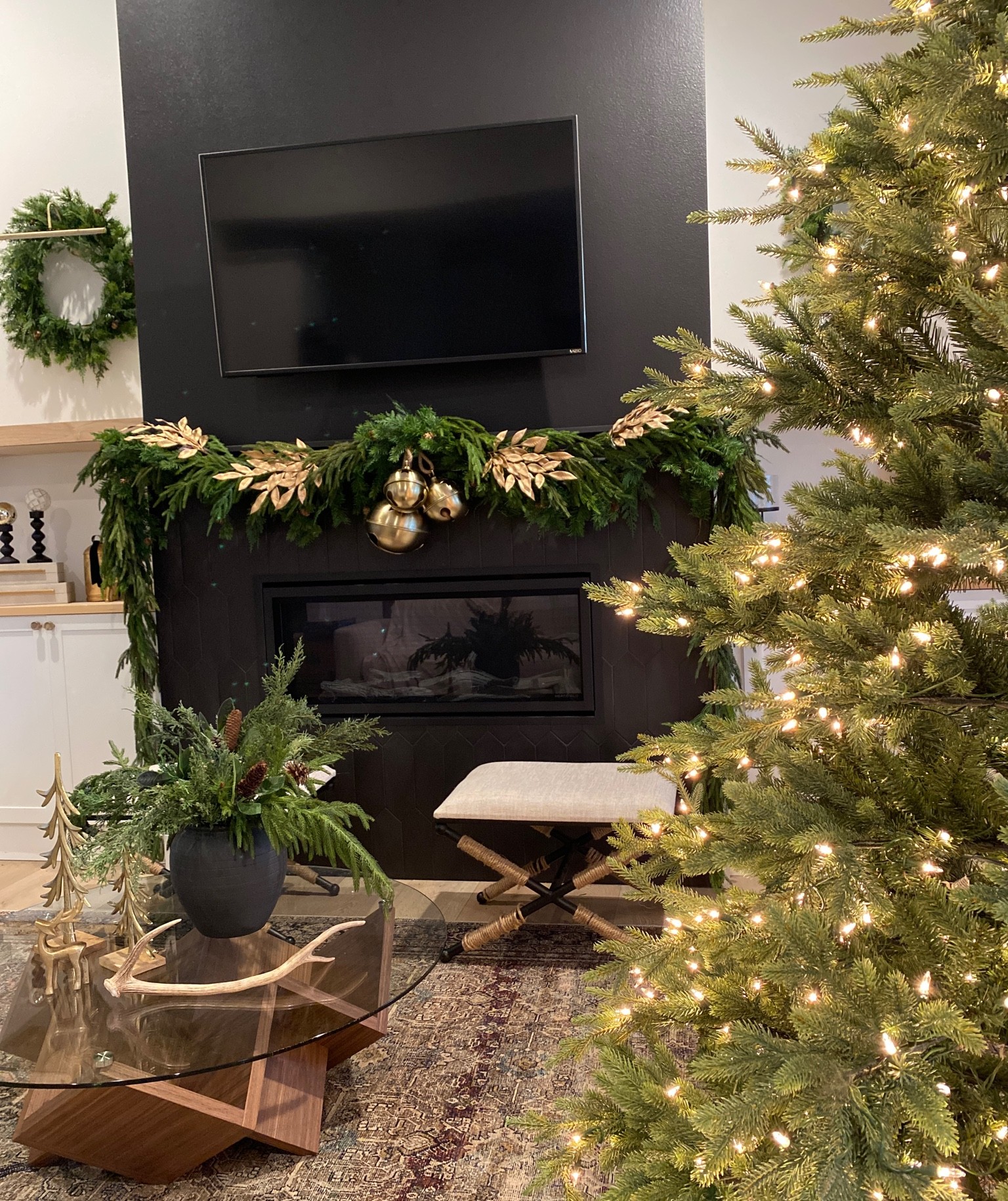 Holiday decor ideas, Christmas mantel, garland, instock garland, Christmas tree gold leafs, gold bells, 

#LTKHoliday #LTKhome #LTKstyletip