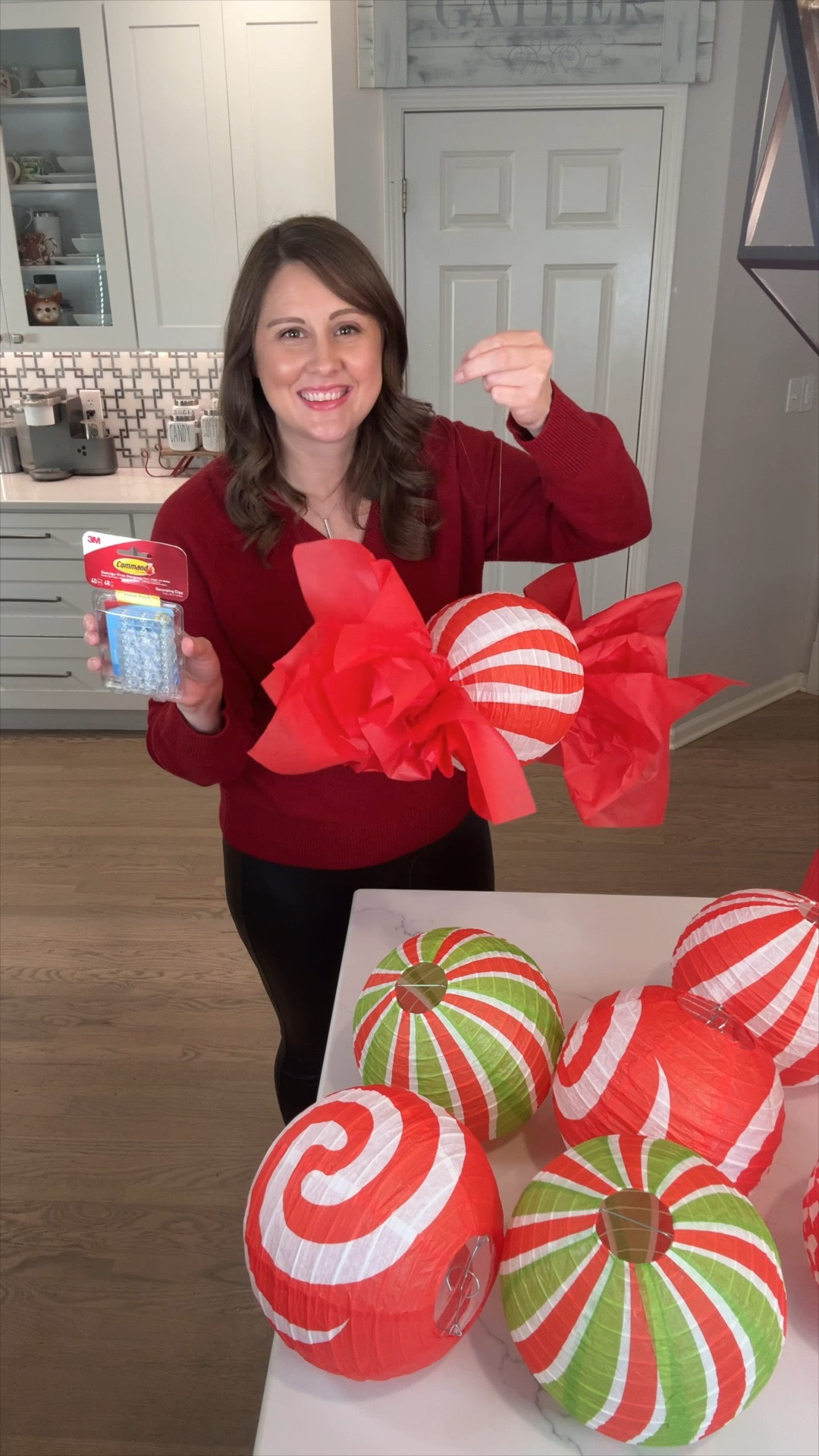 Transform your space into a winter wonderland with this giant candy decor DIY! Just grab some paper lanterns, stuff each side with tissue paper, and voila—they look like oversized candies! Hang them up with fishing line and Command hooks for a festive, fun holiday vibe. Perfect for adding that sweet touch to your holiday decor! 🍬 #HolidayDIY #FestiveDecor #WinterWonderland #ChristmasDecor #HolidayDecor #BudgetFriendlyHoliday 

#LTKHome #LTKSeasonal #LTKHoliday
