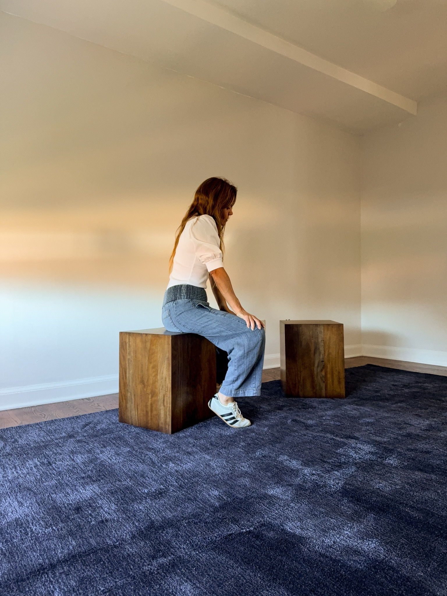 Grounding the bedroom with a deep navy rug and simple wooden cube nightstands. Strong, clean pieces that do the work without adding noise. Shop the look.

#UnclutteredHome #MadeByPatchi #CuratedLiving #DesignThatWorks #BedroomDesign #SimpleLiving #NeutralHome #LTKHome 

 