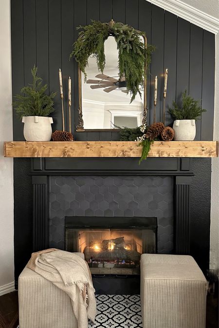 Create a beautiful winter look on your mantel with greenery stems, pine vines and birch candles on gold candlesticks 

#LTKstyletip #LTKhome #LTKSeasonal