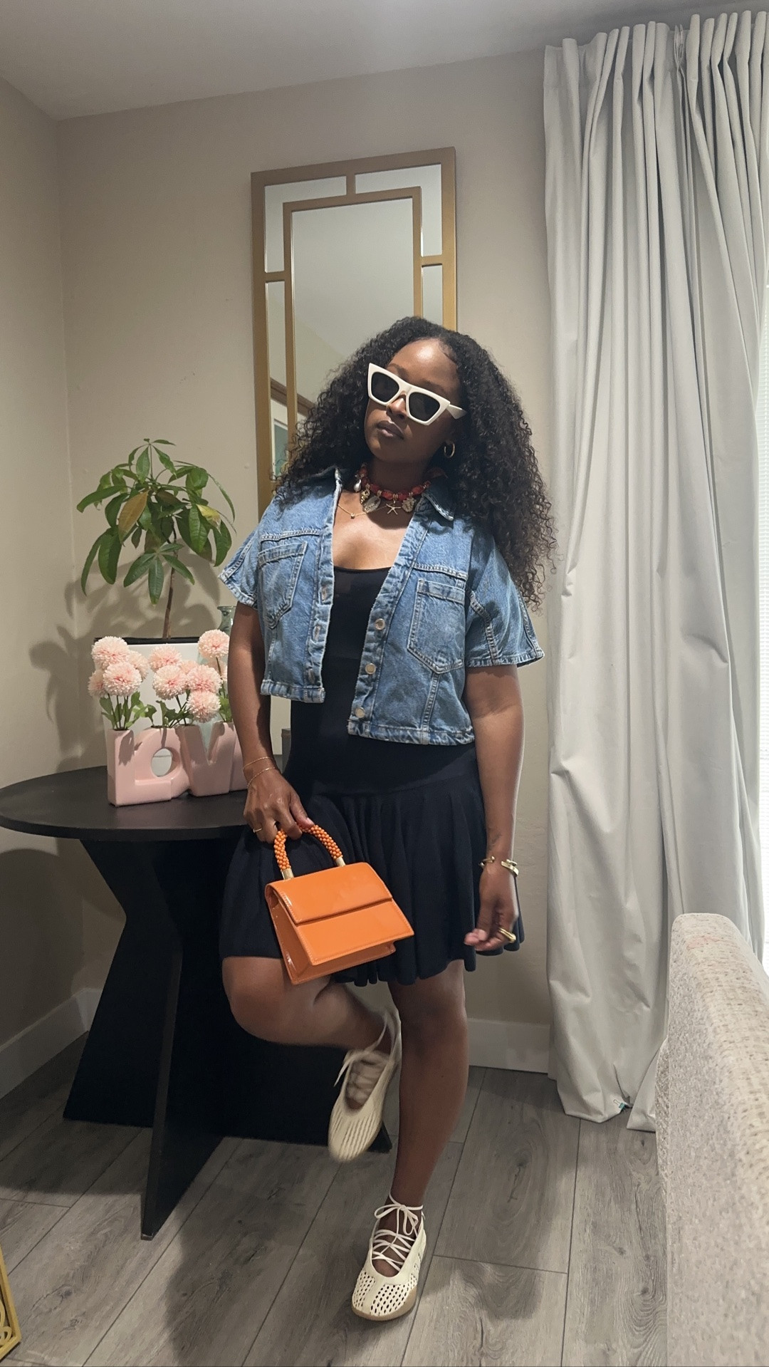 One of my favorite styling tricks is starting with a simple dress and building the outfit from there.

This navy knit dress is beautiful on its own, but adding a few intentional accessories completely changed the look.

For this outfit I paired it with:
🤍 A denim vest
🤍 Adidas ballet sneakers
🤍 Cream sunglasses
🤍 An orange shell scarf necklace
🤍 A structured orange shoulder bag

Notice how the necklace and bag repeat the same warm tones? That’s what makes the outfit feel pulled together without adding a lot more pieces.

If you’re looking for easy mom outfit ideas, Target outfit inspiration, or ways to style a knit dress, I’ve linked everything I’m wearing below, along with similar pieces if your size is sold out.

#TargetStyle #TargetFashion #TargetDress #MomStyle #MomOutfit #DenimVest #AdidasBalletSneakers #BalletSneakers #KnitDress #CasualChic #CoastalLuxe #SummerOutfit #EverydayStyle #StyleTips #OutfitInspiration #LTKStyle #LTKFashion #FashionOver40 #StyleOver40 #SteffanieMonae

#LTKootd #LTKTravel #LTKSaleAlert