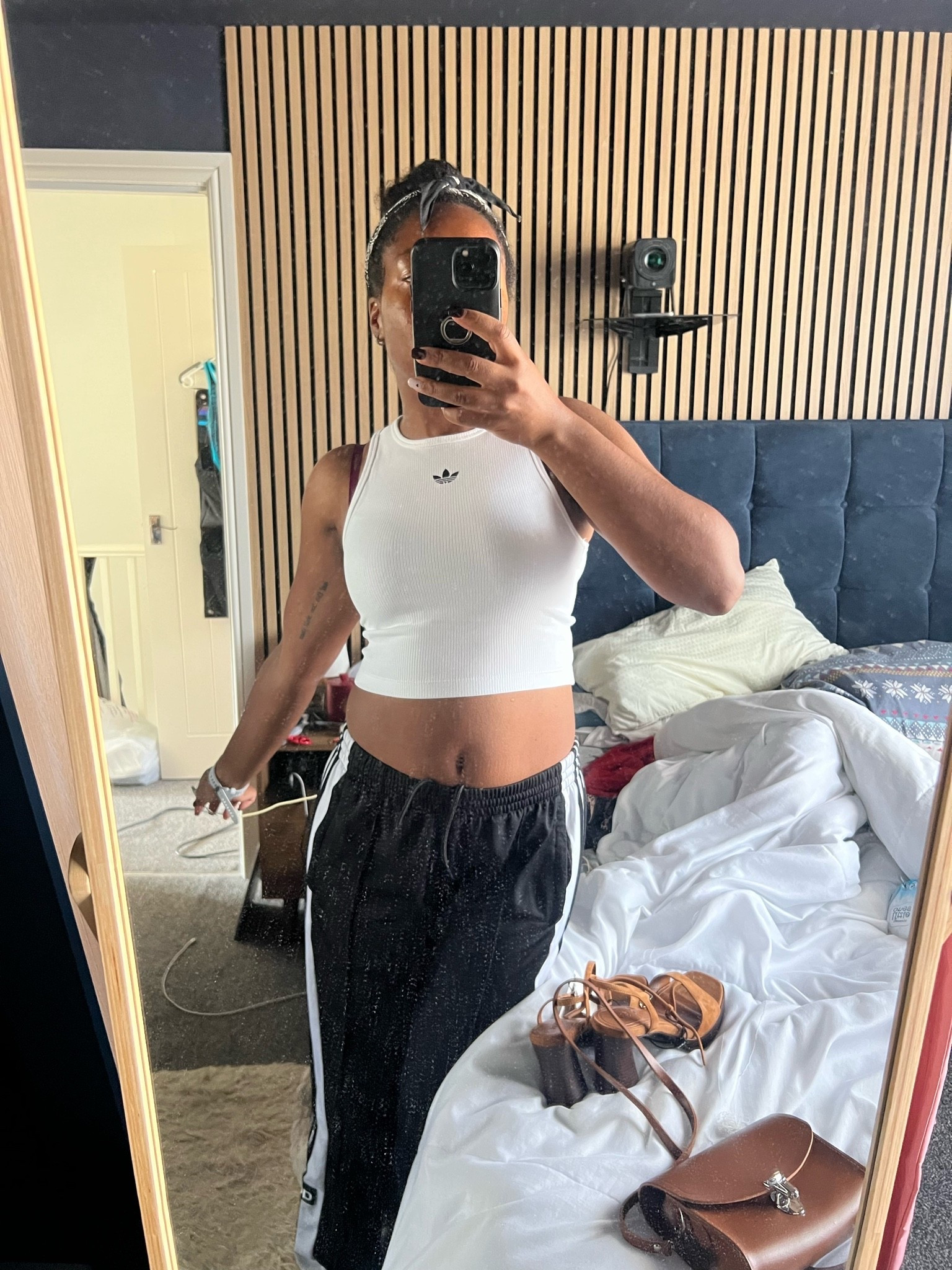 Hot weather, summer outfit, white vest, cropped vest, sporty look, brown shoes, leather shoes, leather handbag

#LTKsummer #LTKfitness #LTKbag
