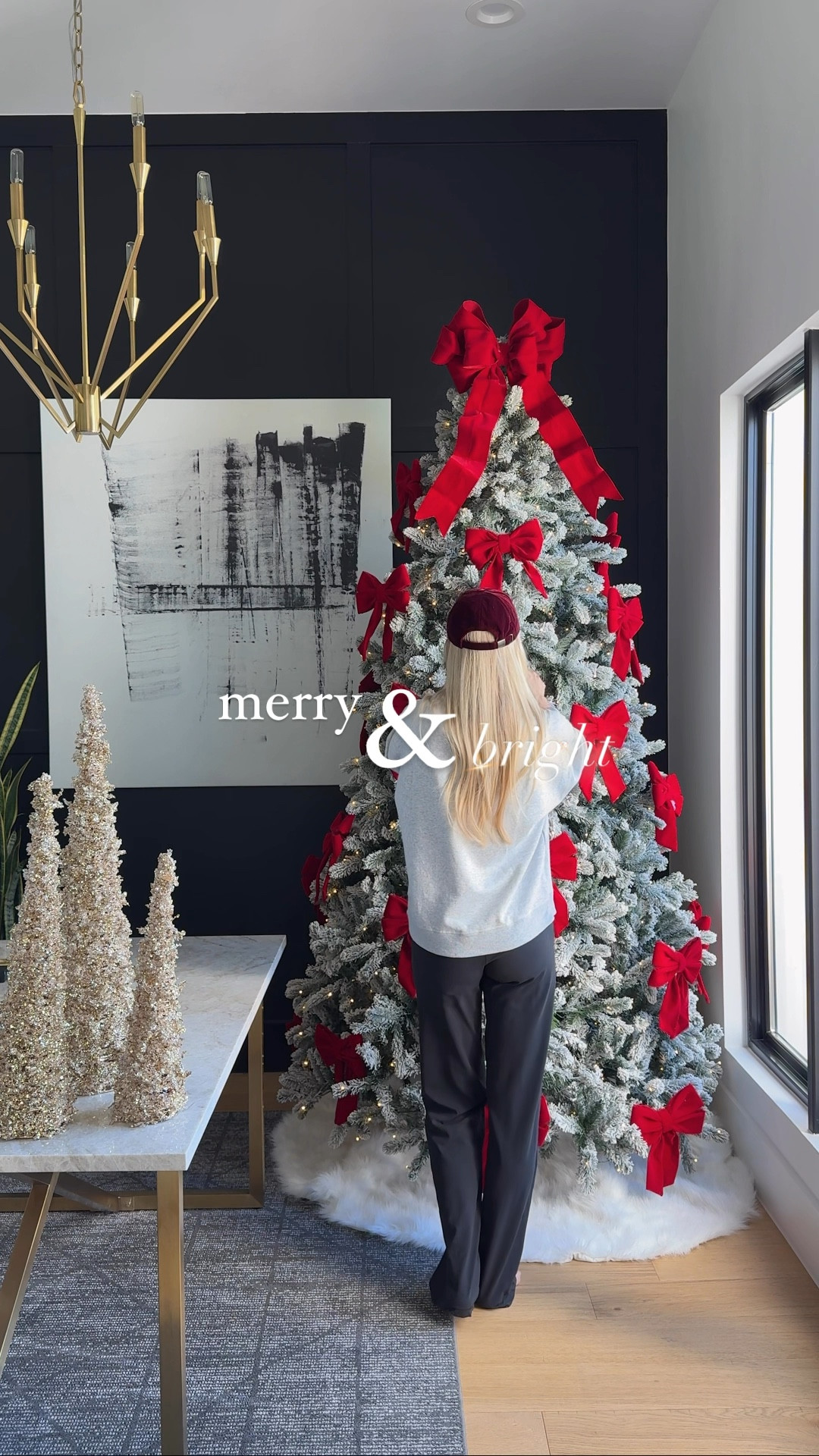 Merry and bright with a gorgeous flocked tree and all the red bows.



#LTKHome #LTKSeasonal #LTKHoliday