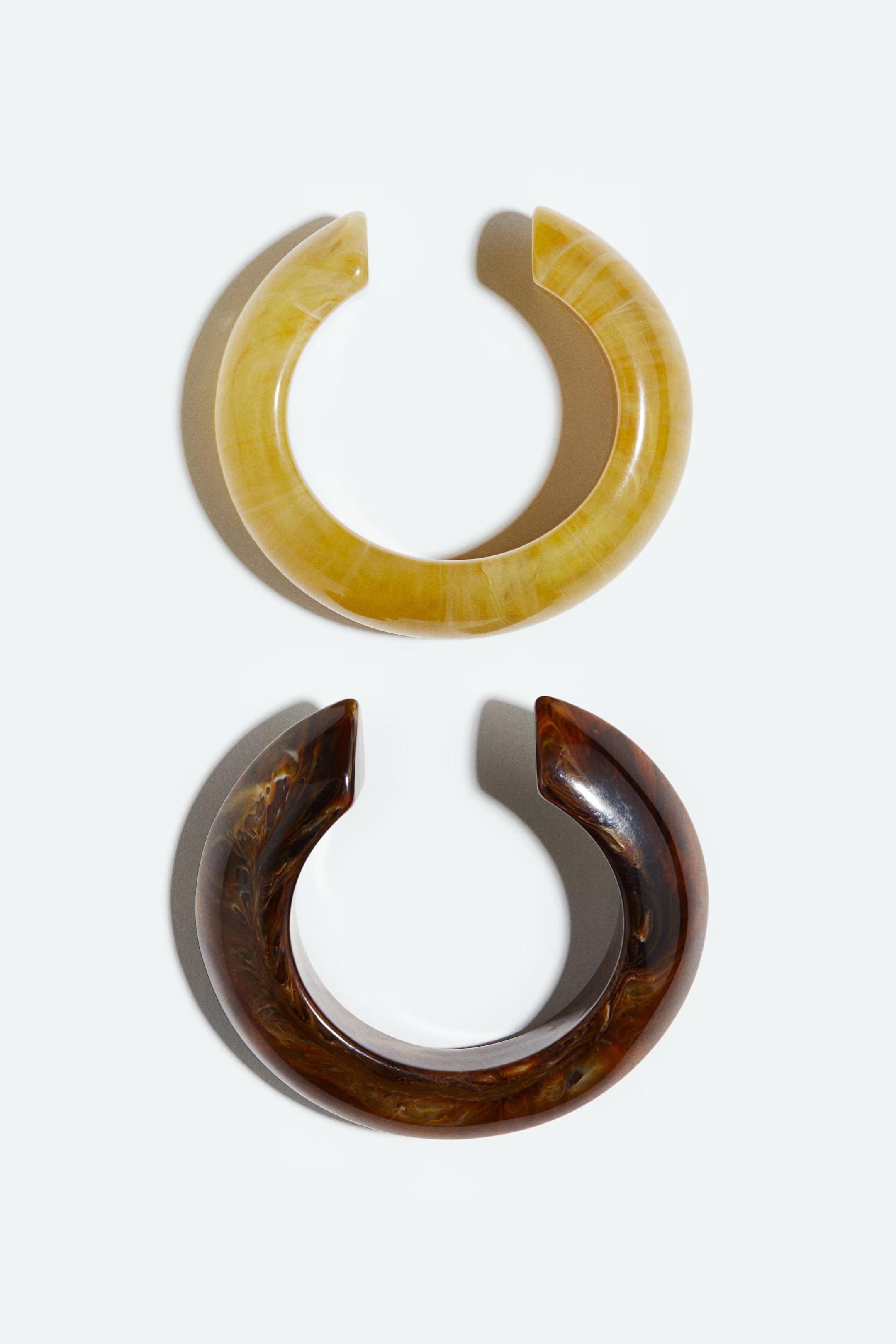 Bracciali rigidi 2 pezzi - Marrone scuro/giallo - DONNA | H&M IT | H&M (FR, IT, ES, PT, BE)