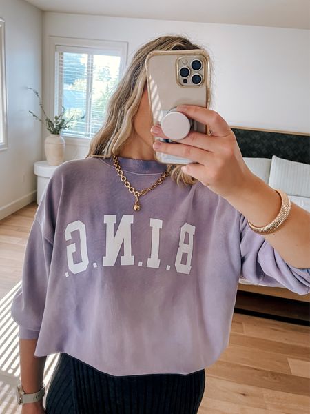 A closer look at this oversized sweatshirt 

It’s got a washed look with distressing details along the collar

I tugged it in, but it’s pretty long that I love. Great for wearing over leggings or tugged in with jeans. May options to style this beauty 