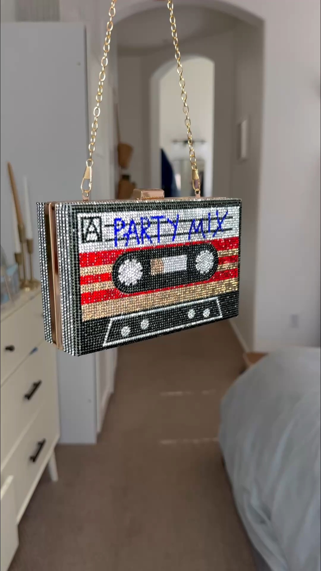 This rhinestone cassette tape clutch is giving all the nostalgic vibes! 📼✨ I can’t get over how sparkly it is, and it’s actually roomy enough for my phone, keys, wallet, and way too many lip glosses 😂 If you love fun statement accessories without the designer price tag, this one is such a good find!

#LTKgrwm #LTKootd #LTKOver40