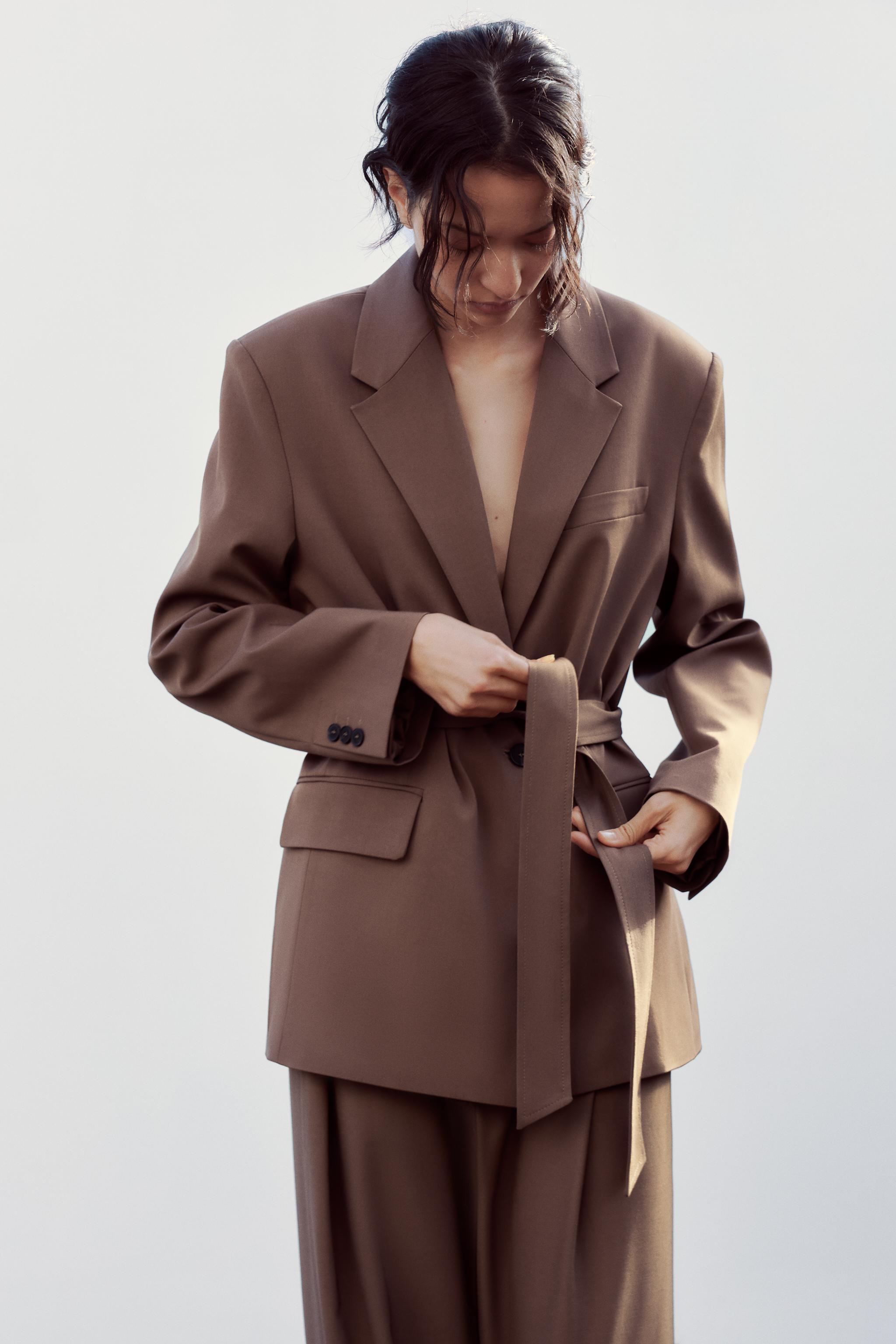 Lapel collar blazer. Long sleeves with shoulder pads. Front pockets and a false welt chest pocket... | Zara US