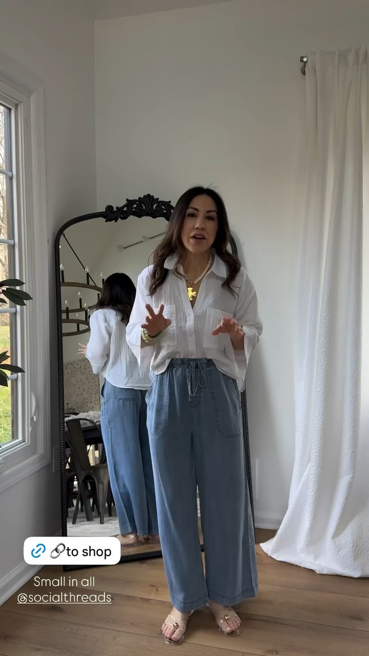 Small white gauze, button-down shirt. Small chambray pants.

#LTKPetite #LTKOver40