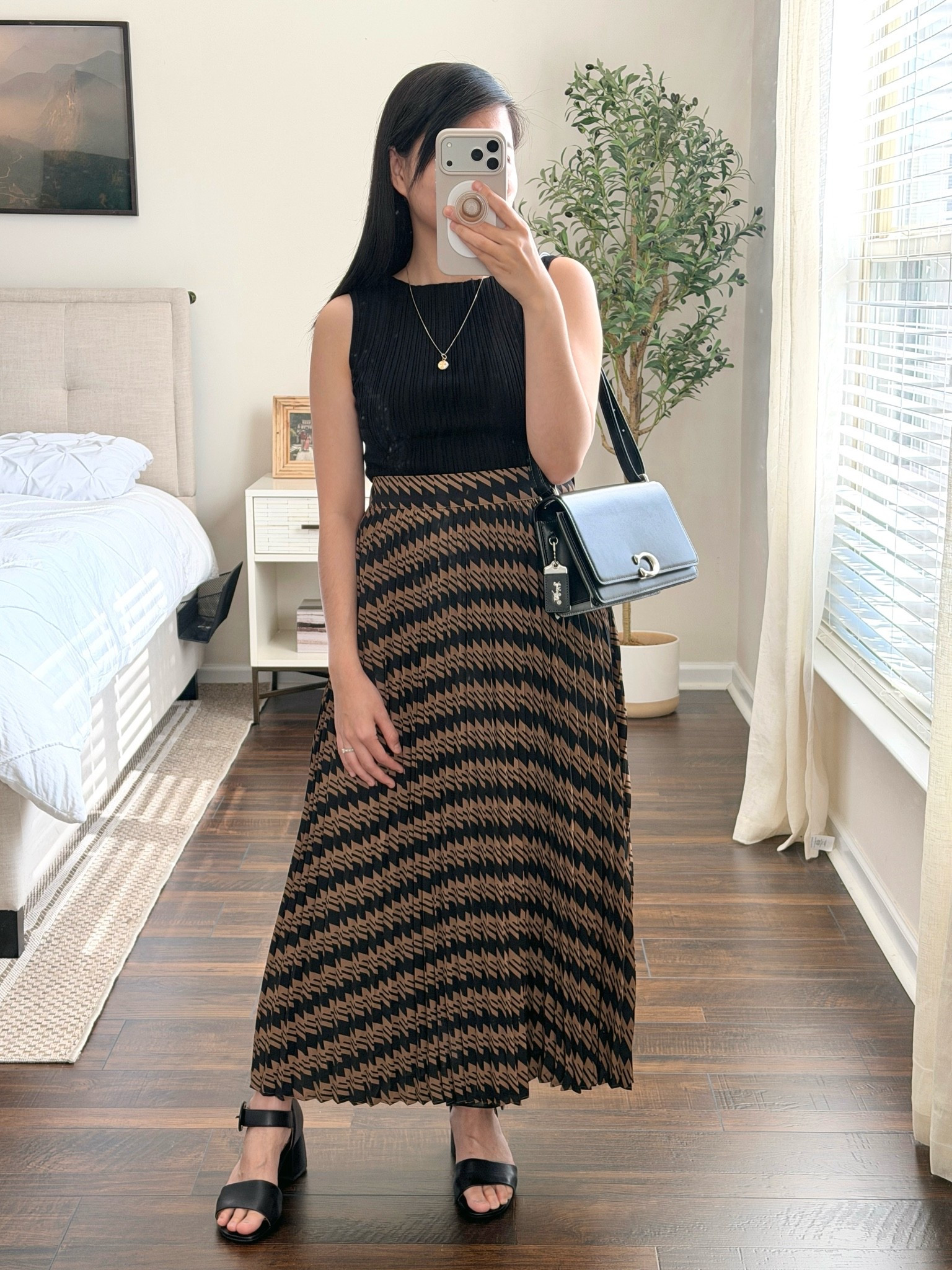 Business casual workwear inspo! 💼 Featuring the Cotton Cashmere Ribbed Tank from Quince paired with a pleated midi skirt for a polished, office-ready look. 🖤 Such a pretty and refined outfit that feels comfortable while still looking put-together! 💫 Linked the look with similar styles! 👀 #PetiteFashion #WorkwearStyle #BusinessCasual @Quince @Vionic Shoes

#LTKootd #LTKWorkwear #LTKPetite