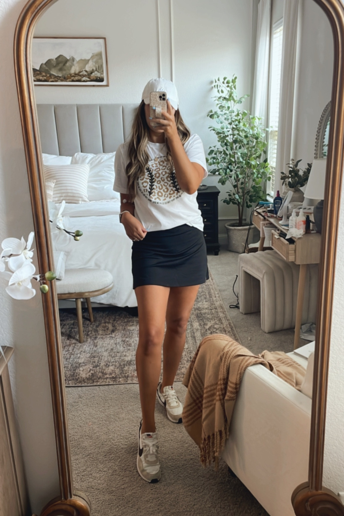 Softball mom outfit, sports mom, old navy athletic skirt, softball shirt, neutral tennis shoes, Nike 

#LTKfamily #LTKstyletip #LTKunder50
