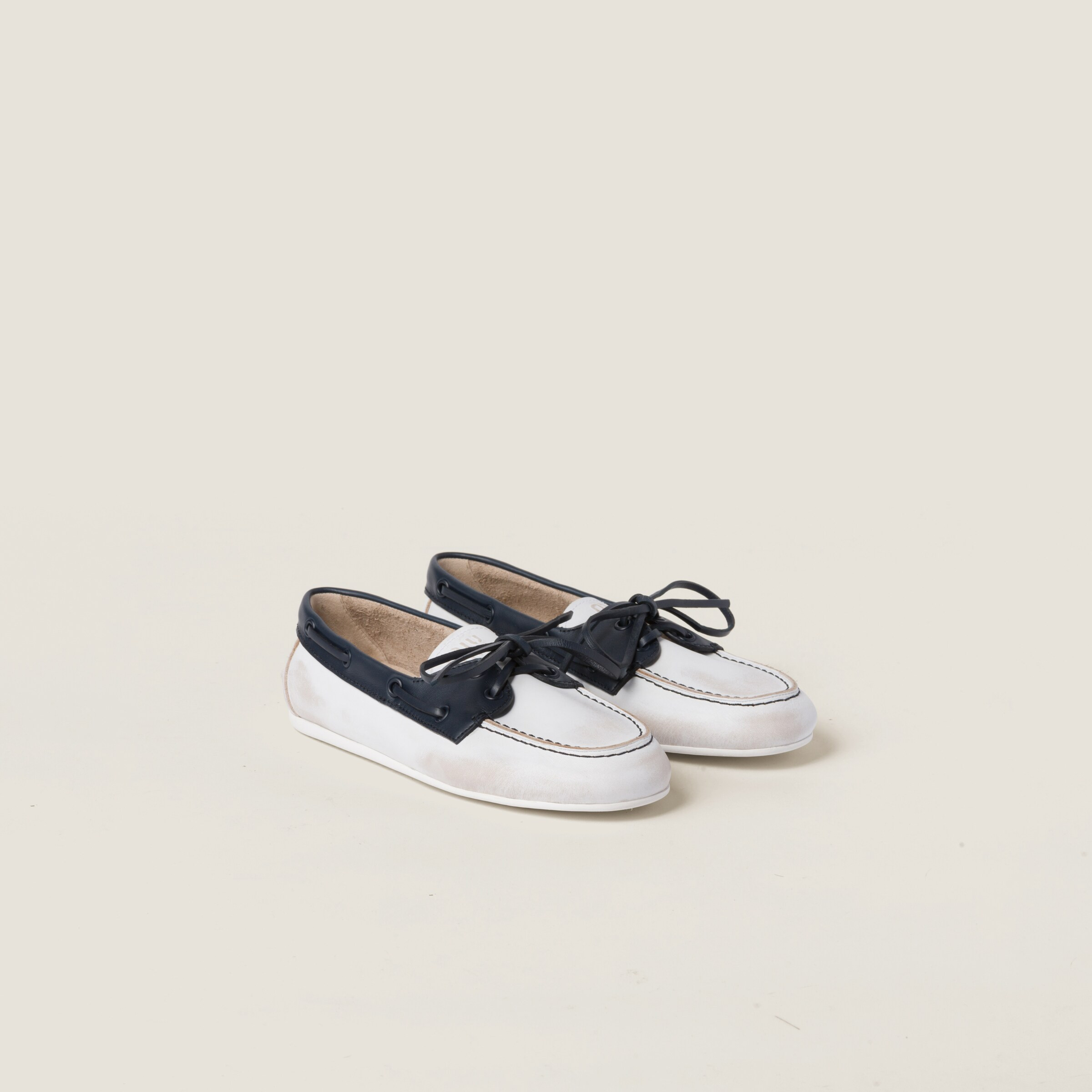 MiuMiu logo | Miu Miu US