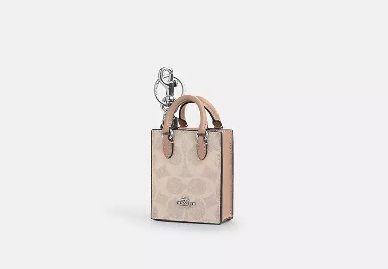North/South Mini Tote Bag Charm In Signature Canvas | Coach Outlet US