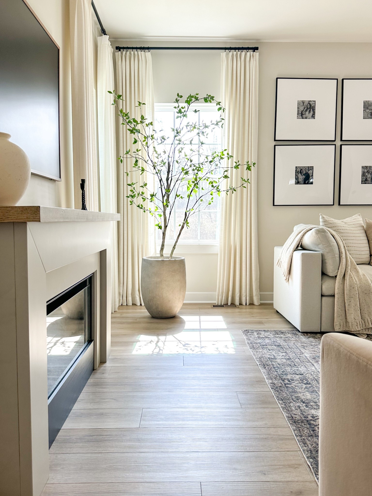 Cozy living room corner 
#livingroom #homedecor #fireplace #citrustree #rug #loloi #realflame #homerilla 

#LTKHome