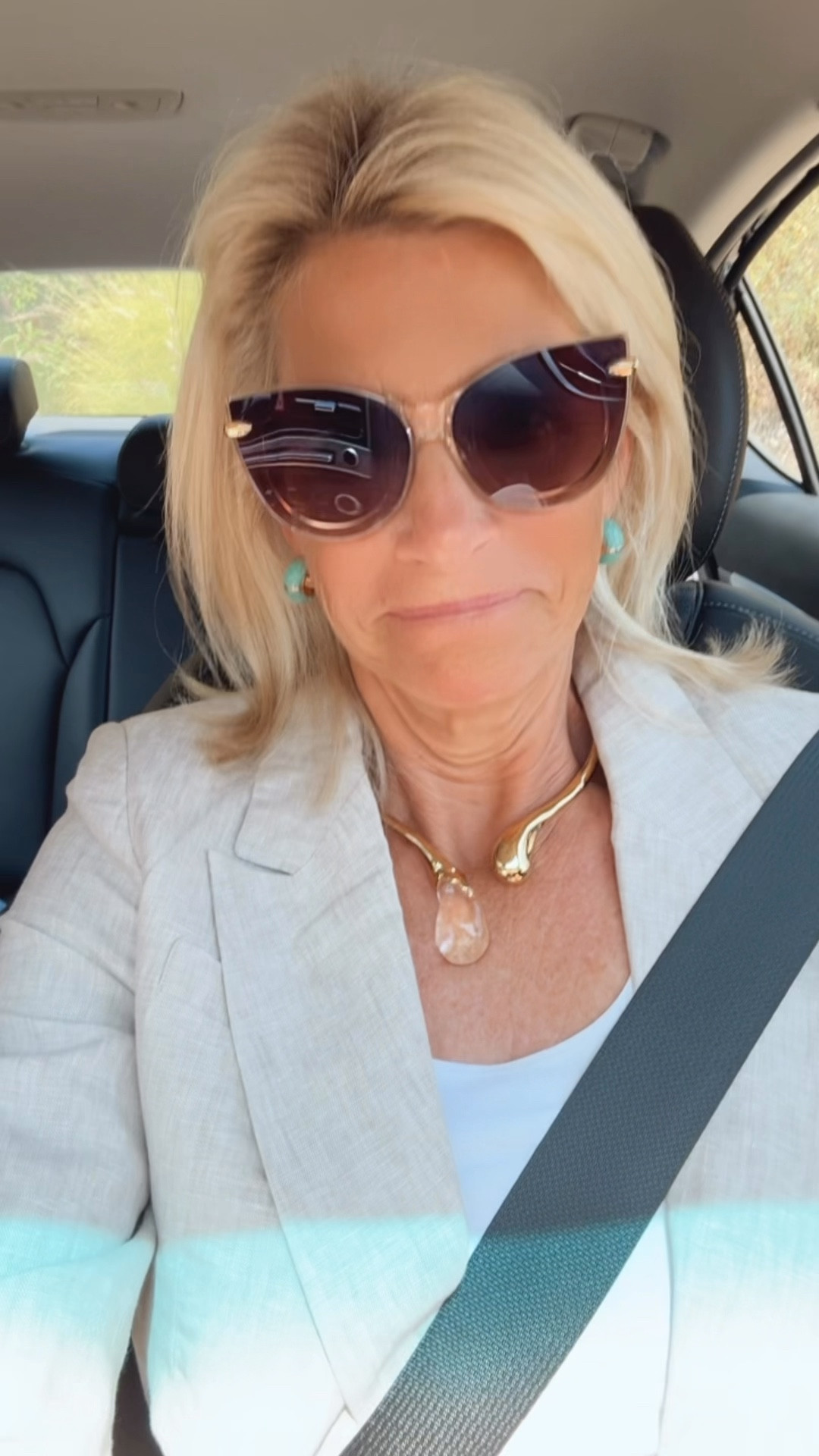 I am 💯 a backseat driver.  That’s ok. I look cute in my ootd OOTN.   Quince beige linen blazer with brown cigarette pants , a white tank and my new fancy beige patent leather sandals.  Oh and I’m
Carrying the $83 bag 😂

#LTKOver40 #LTKdayinmylife #LTKootd