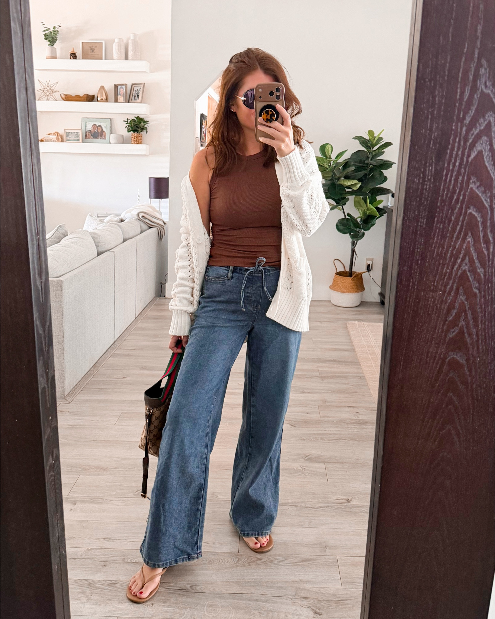 ￼Casual OOTD!

Loving these pull on super cozy Walmart jeans, I’m wearing a size extra small and they have an elastic band in the back! Also sporting one of my favorite Amazon tanks and I’m loving this open work cardigan from Walmart! ￼

#LTKOver40 #LTKMidsize