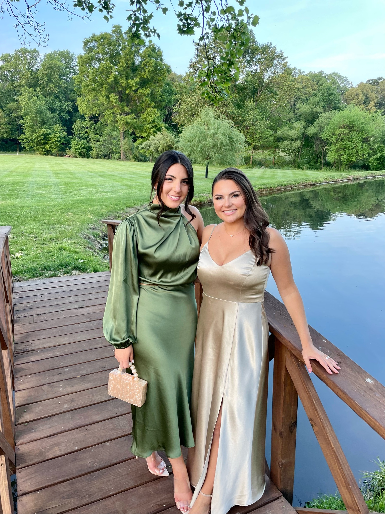 This stunning olive satin one shoulder maxi dress from petal and pup linked below with a few similar options from Amazon.
Also linked below is the beautiful champagne bridesmaid dresses. 
Olive dress runs small: sized up to a large 
Shoes: sized up half size to a 9 



#weddingguestdress #weddingguest #cocktaildress #bridesmaiddress #satindress #oneshoulderdress #olivedress #goldclutch #nudeshoes #weddingshoes #bridesmaidideas 

#LTKunder50 #LTKwedding #LTKunder100