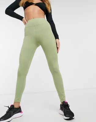 In The Style x Courtney Black activewear panelled legging in olive | ASOS (Global)