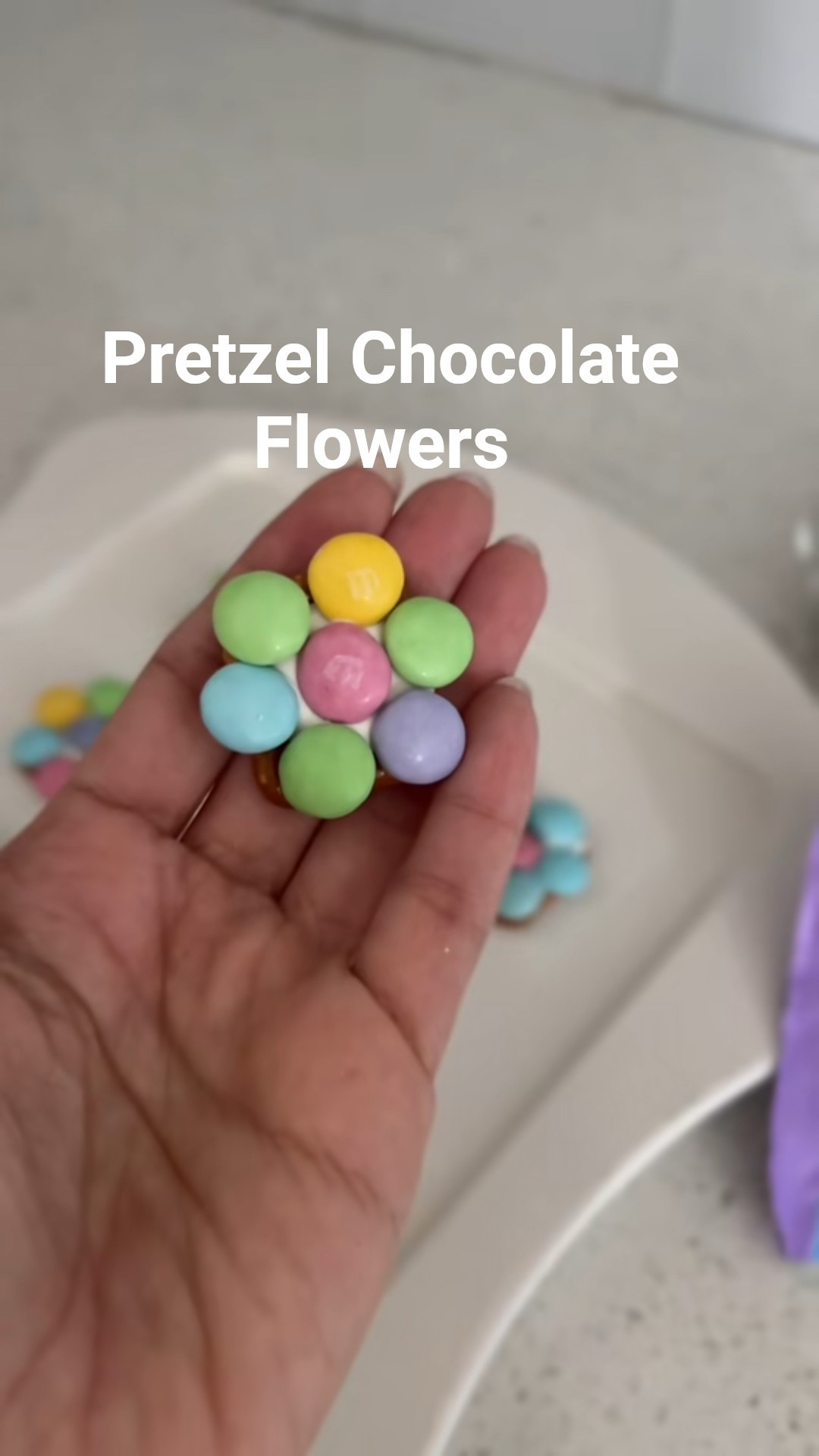Try these to upgrade your Easter Charcuterie  Boards. So easy, melt white chocolate to your pretzel and while still warm, start adding your pastel M&M’s. #easterideas
