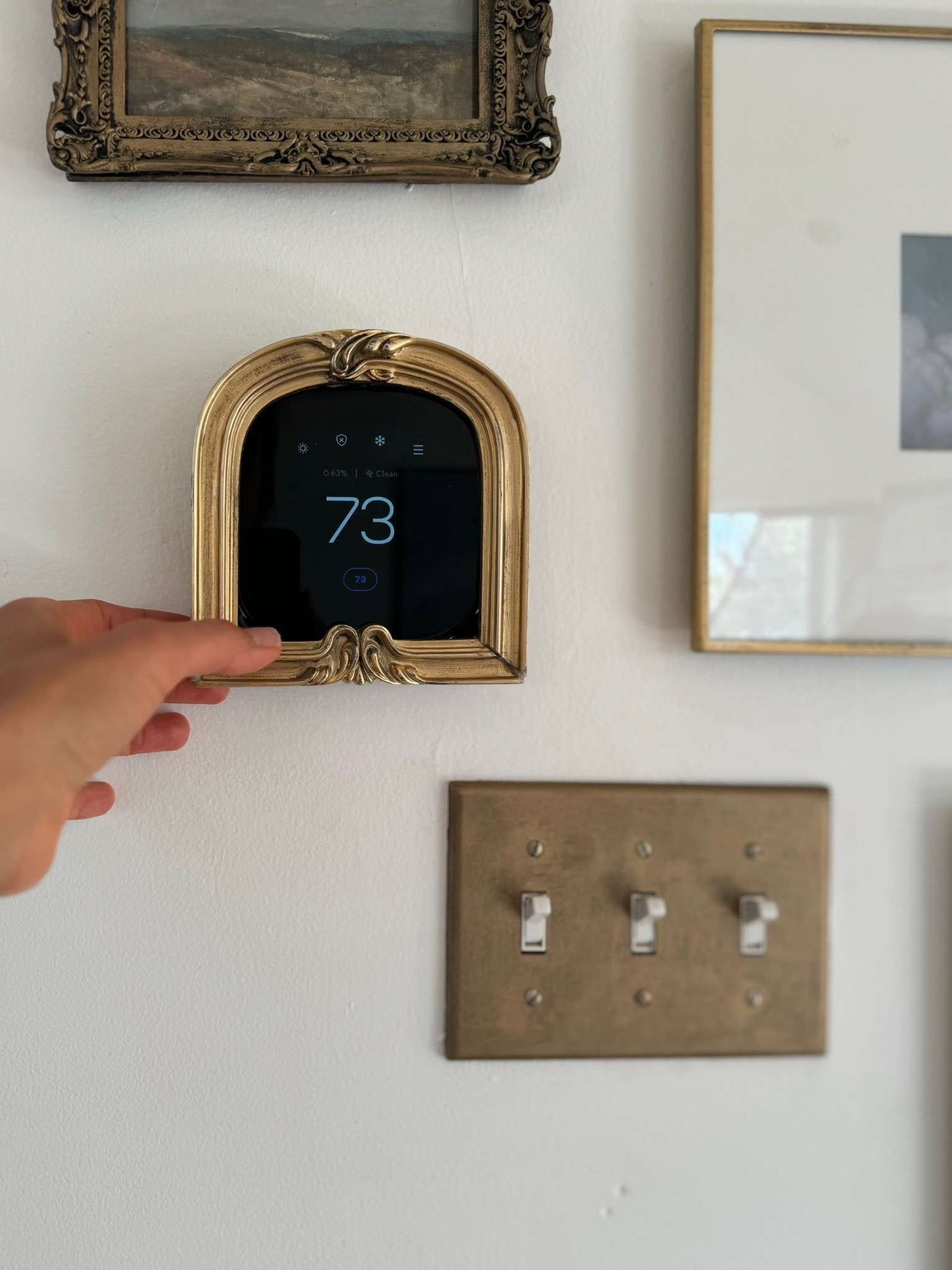 Make your thermostat pretty by adding a gold frame! 🖼️ ❄️ 

#LTKHome #LTKdayinmylife #LTKFindsUnder50