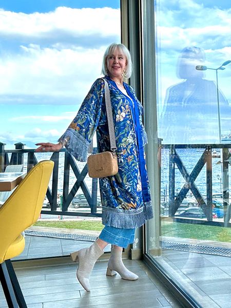 Garden Crane Kimono robe with fringe trim hem and sleeves. Also wear it as a duster over crop wide leg jeans by Chico’s and mesh booties by Vivaia. 
Cork bag by Korkgoods- not linked. 


#LTKover40 #LTKshoecrush #LTKtravel