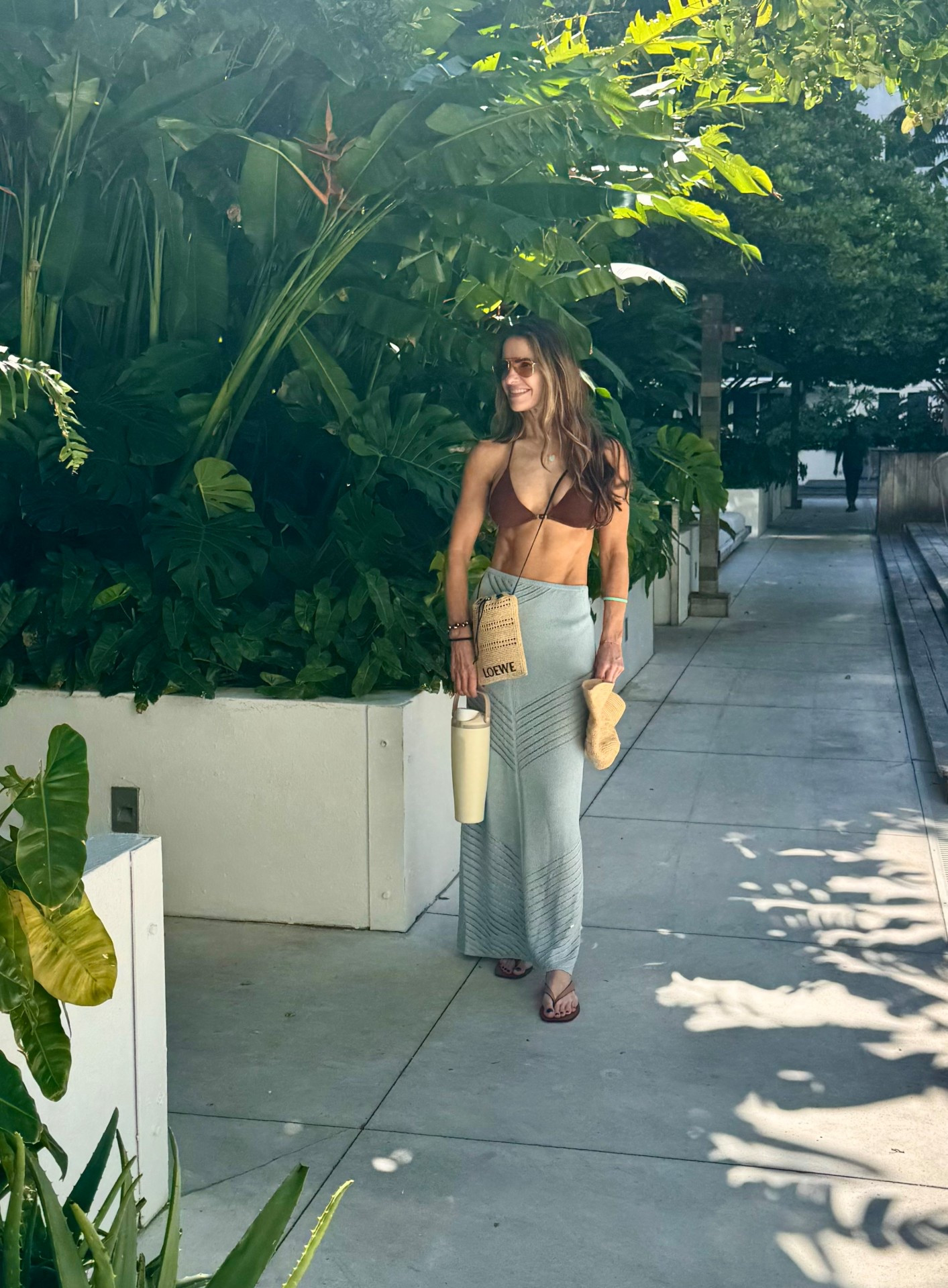 vamos a la playa…off to the beach🩵 wearing my new, fav suit & cover-up brand too! 

top runs tts wearing small size up in bottoms wearing M 

skirt runs tts wearing a small! 

sandals are so comfy can wear to beach or out to dinner  

& even shop my new water bottle has a lock & unlock button for no spills + fits 40 ounces & into your cup holder as well...best gift to give anyone on your list!  

#LTKSaleAlert #LTKGiftGuide #LTKTravel