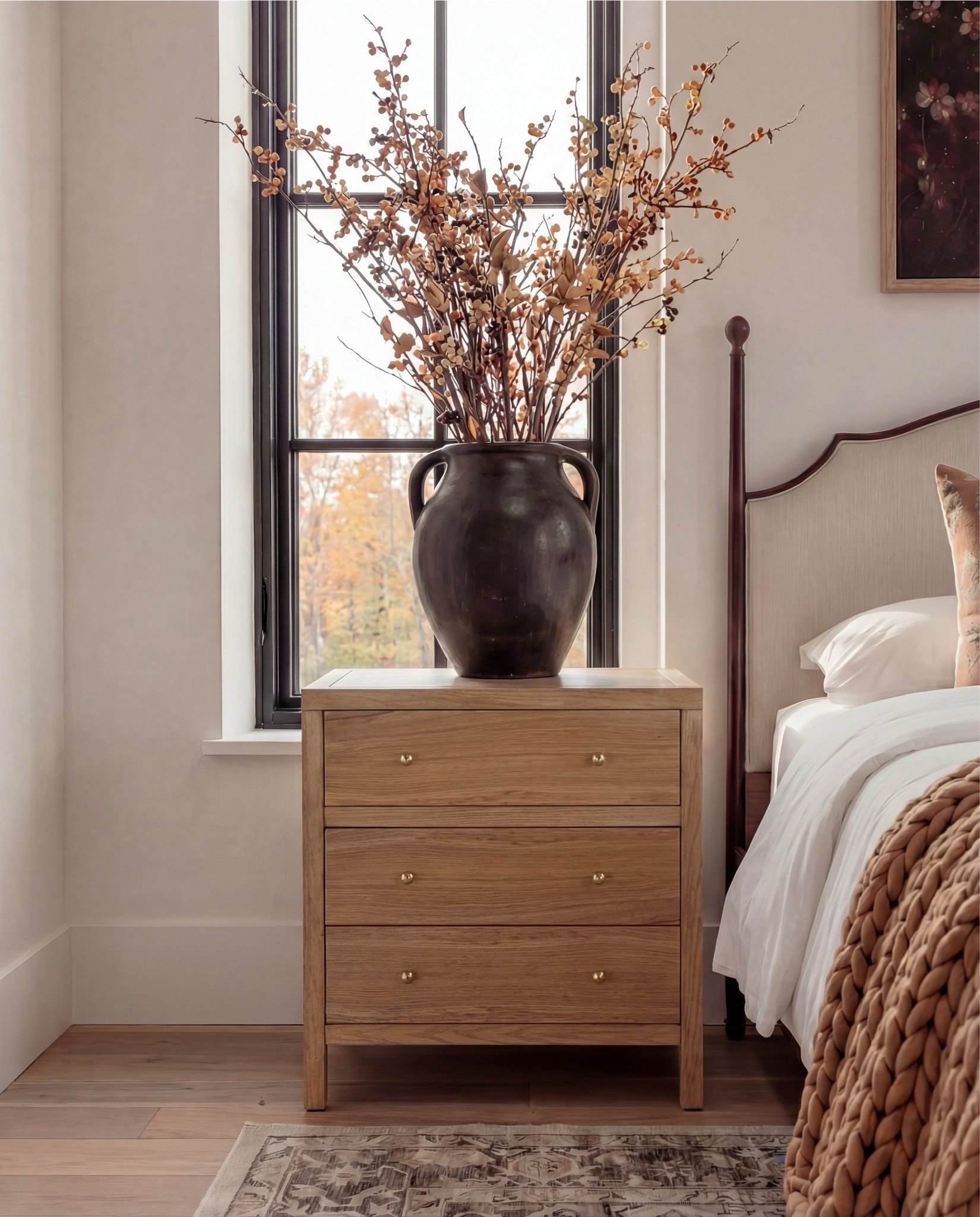 Shop the Look: Bedroom Refresh
Furniture & Decor
	•	Upholstered wood bed frame (cream fabric)
	•	White bedding set
	•	Chunky knit throw (camel)
	•	Patterned accent pillows (rust/brown)
	•	Wood nightstands
	•	Ceramic white table lamps white shade)
	•	Curved brass-framed wall mirror
	•	Framed floral wall art above bed
	•	Upholstered boucle bench stools (set of two)
	•	Vintage-style area rug (neutral pattern)
	•	Wood dresser with brass corner details
	•	Decorative ceramic vase
	•	Stacked neutral books
	•	Brass decorative tray
	•	Sculptural brass object
	•	Framed artwork above dresser



#LTKSaleAlert #LTKHome