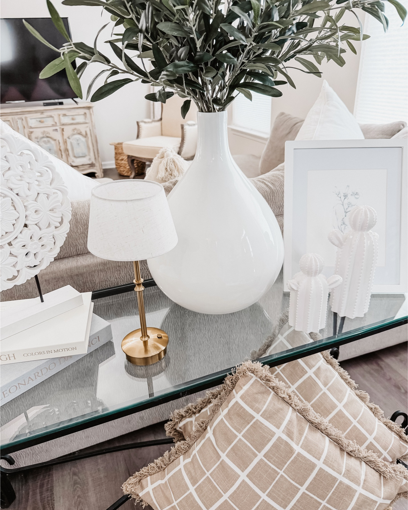 Styling my entry table with layers, texture, and timeless details 🤍

#EntryTable #HomeStyling #InteriorDesign #HomeDecorInspo #InteriorVibes 