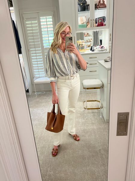 Splurge top. Love this Zimmerman linen striped top! The button detail is exquisite. I’m wearing size 1. Puffy sleeve top perfection. Paired with Ivory denim from Frame, Hermes Oran sandals and Hermes Picotin handbag. Wearing white b-low the belt as well  

#LTKitbag #LTKshoecrush #LTKover40
