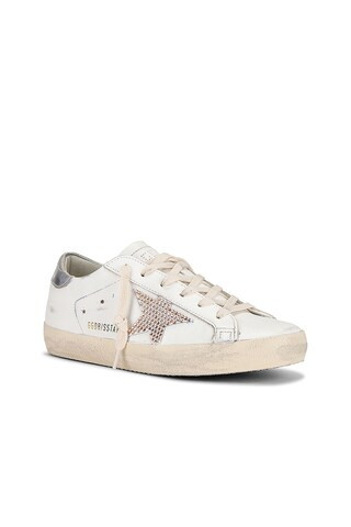 Golden Goose Super Star Sneaker in White, Silver, & Platinum from Revolve.com | Revolve Clothing (Global)