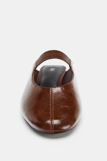 Slingback ballet flats. Topstitching detail at front. Elastic strap on the instep. Round toe.Sole... | Zara US