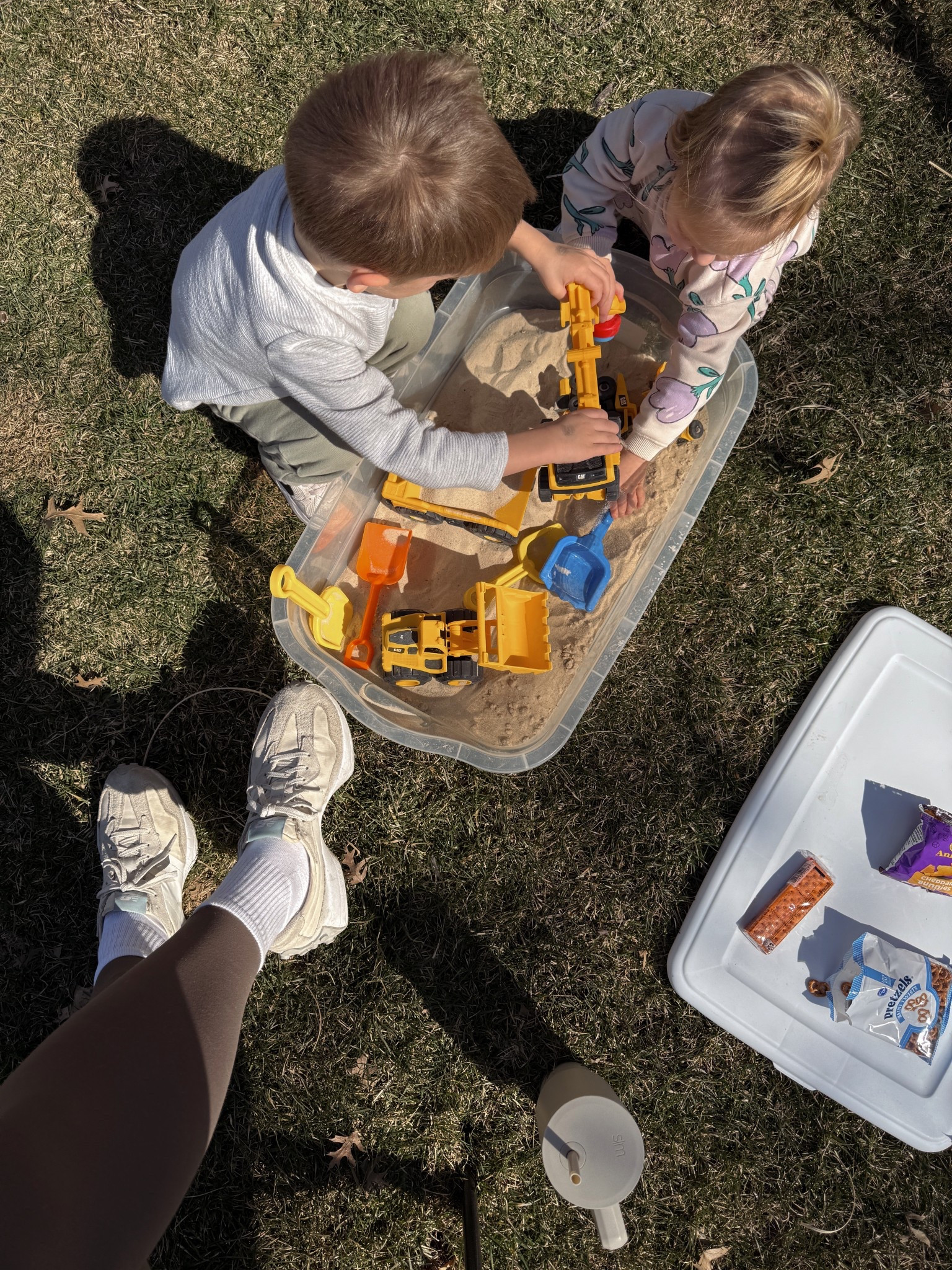 Easy sensory box — $10 plastic storage tub from Target + sand/rice and alllll the scoops, shovels, trucks, etc! My toddlers will stay occupied for SO long with anything like this. 

#LTKSeasonal #LTKKids #LTKFamily