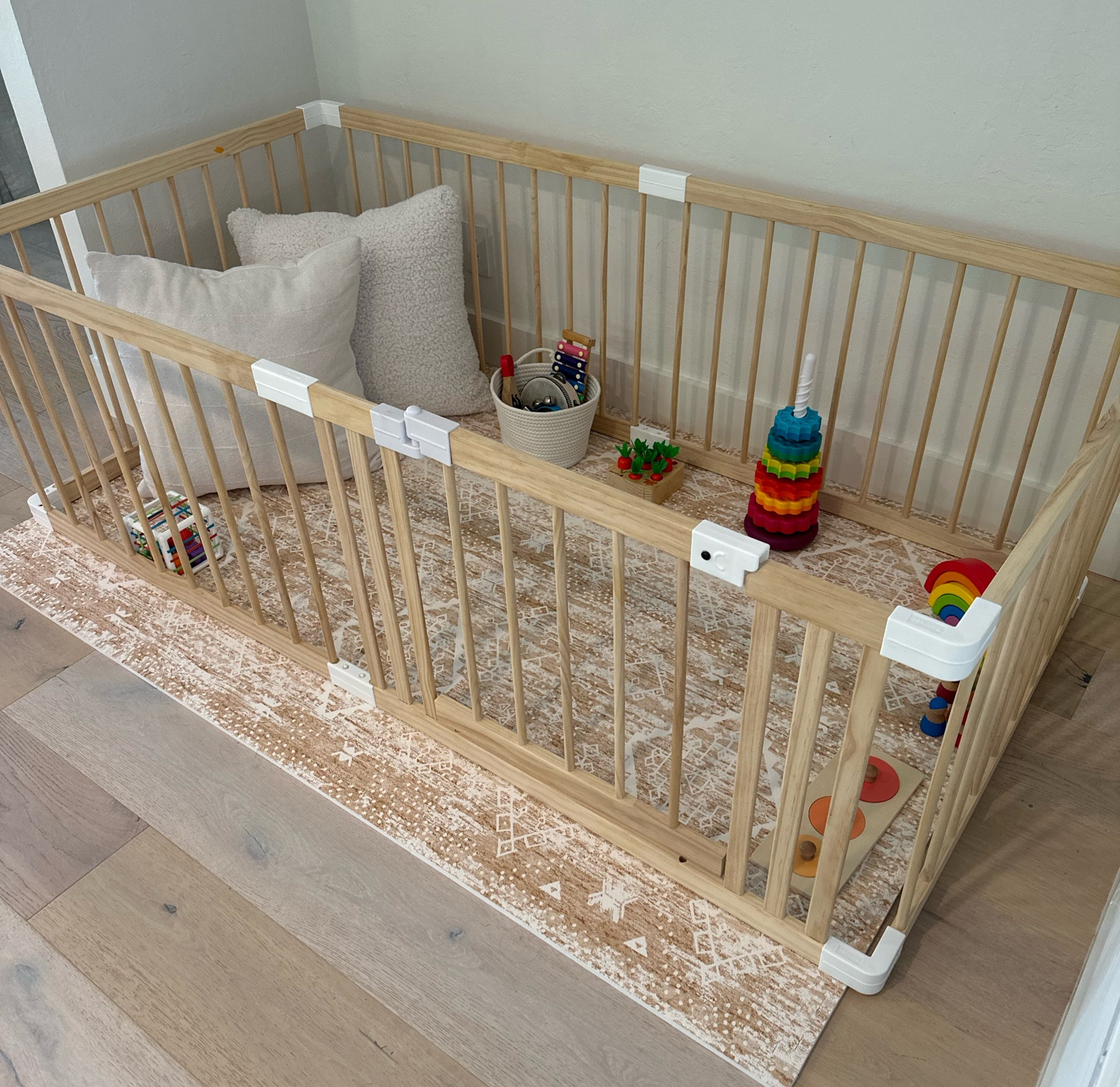 Our baby jail upgrade! Love the new playmat & the softness of adding pillows 