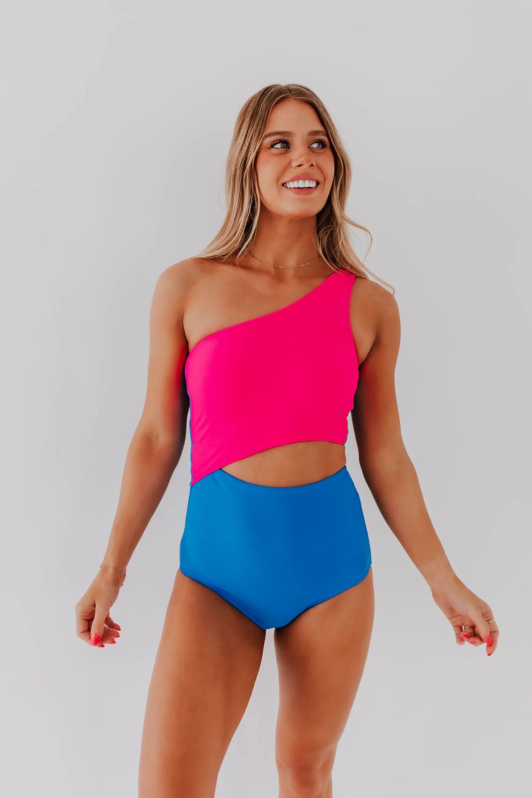 HARPER CUT OUT ONE PIECE IN NEON BLUE AND PINK COLOR BLOCK BY BETSY MIKESELL X PINK DESERT | Pink Desert