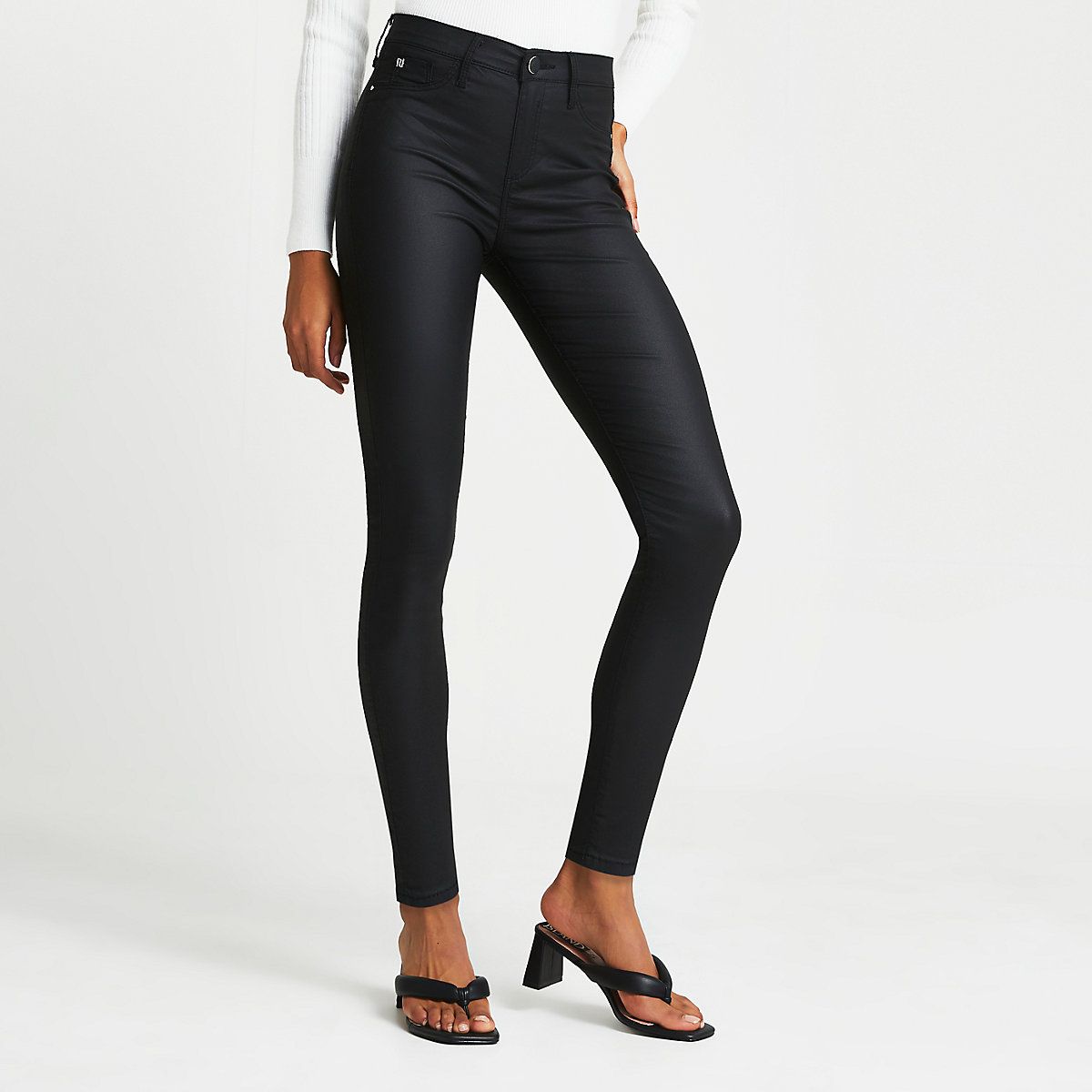 Black coated Molly jeggings | River Island (UK & IE)