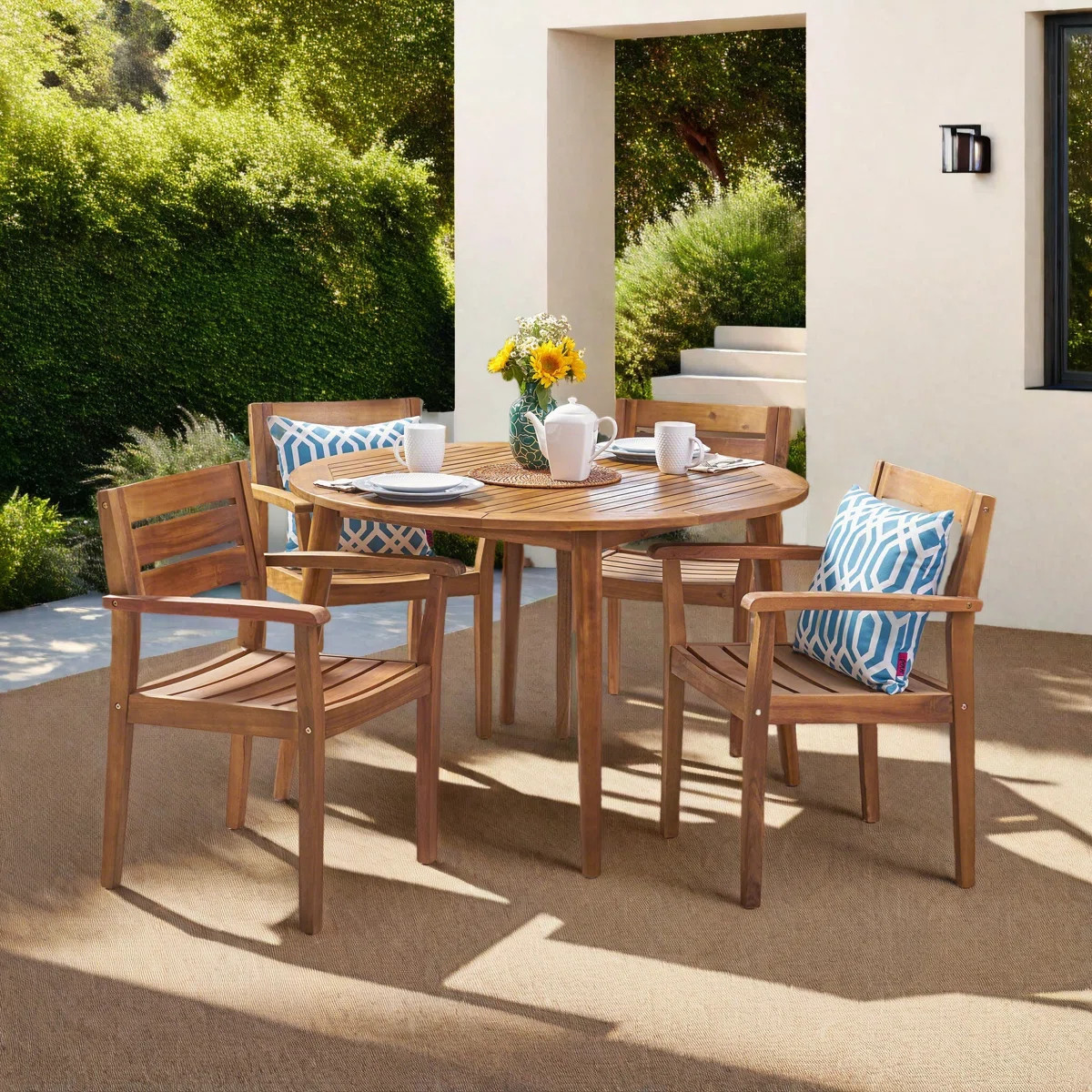 Schmitz 4 - Person Acacia Wood Patio Dining Set with Round Table | Wayfair North America